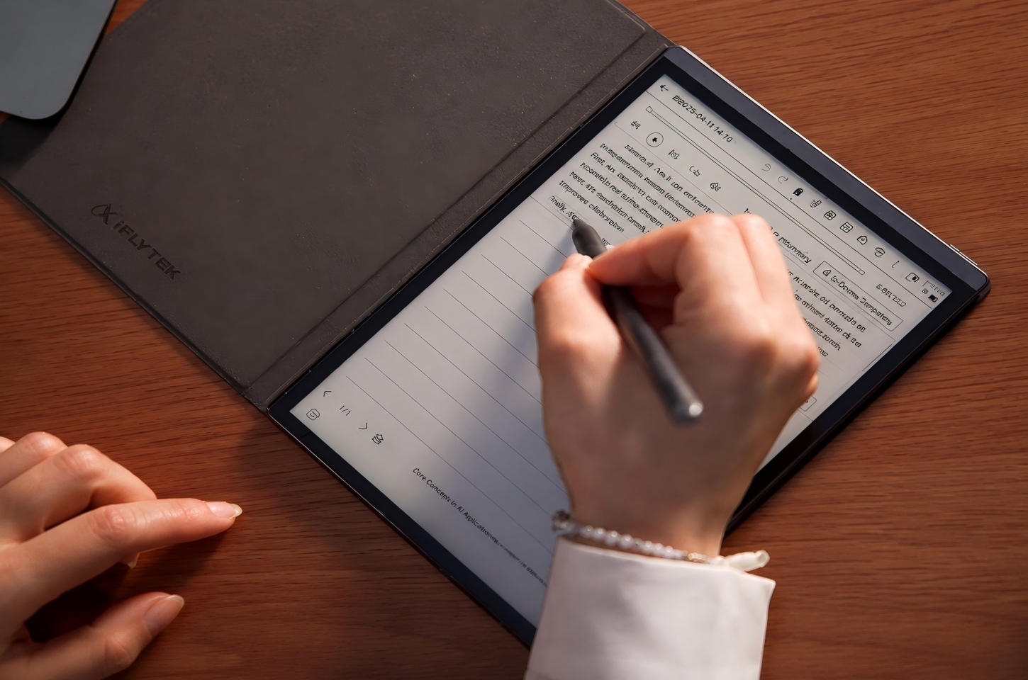 Handwriting on AI note tablet with stylus on desk