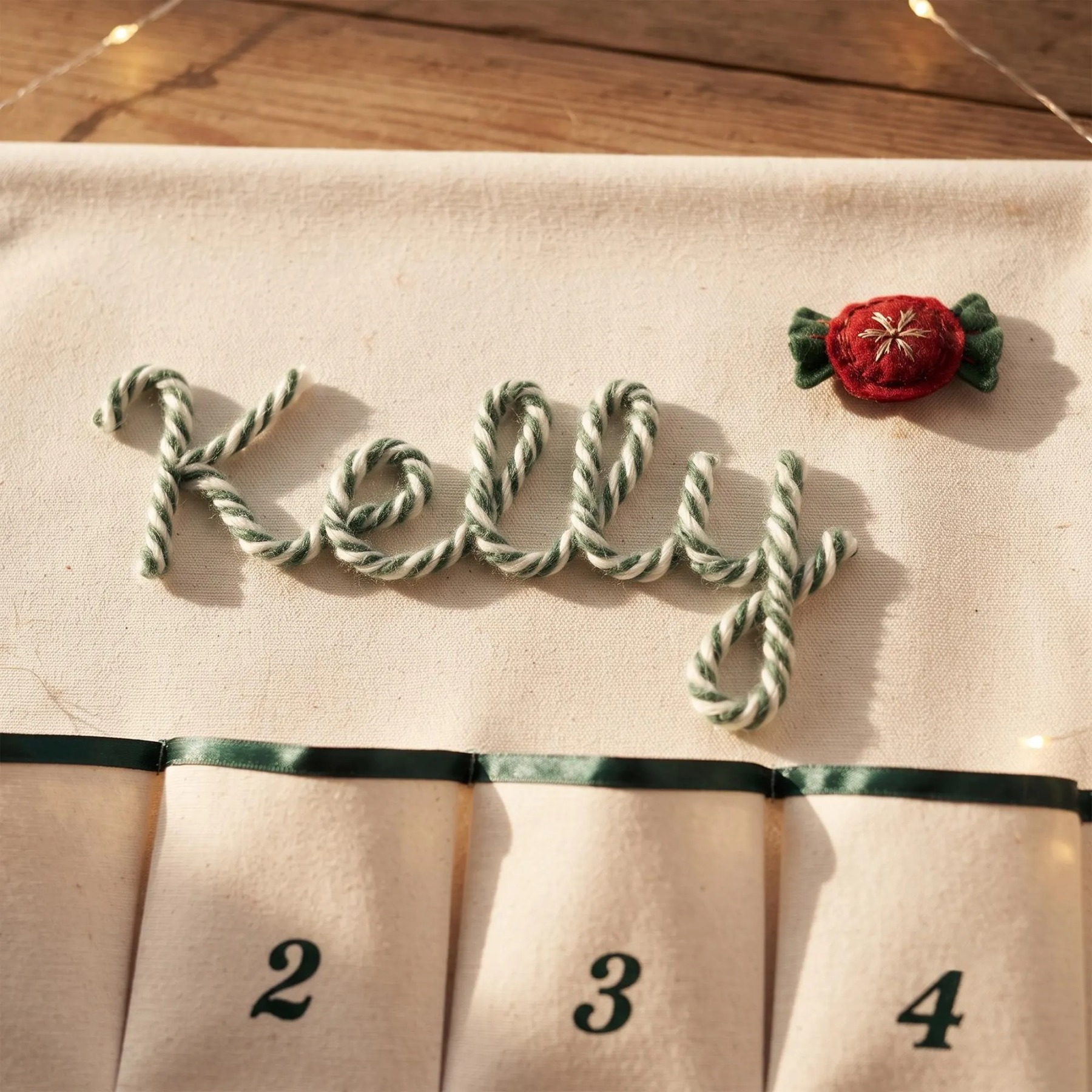 Personalized Christmas Advent Calendar – Custom Name Embroidered Fabric Countdown with 24 Pockets, Red or Green Strap, Reusable Holiday Decor for Kids & Families