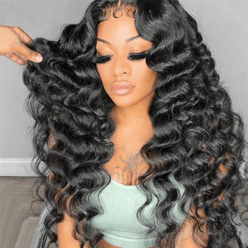 Woman With Voluminous Loose Deep Wave Black Hair, Showcasing Ishow Hair Wig