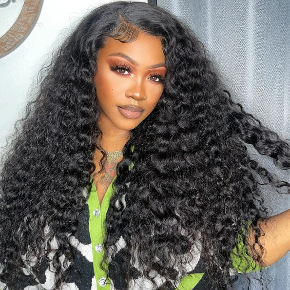 Model With Loose Deep Wave Black Hair Showcasing Ishow Hair Wig