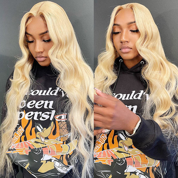 Model Wearing 613 Blonde Body Wave Wig With Long, Flowing Locks and Stylish Hoodie