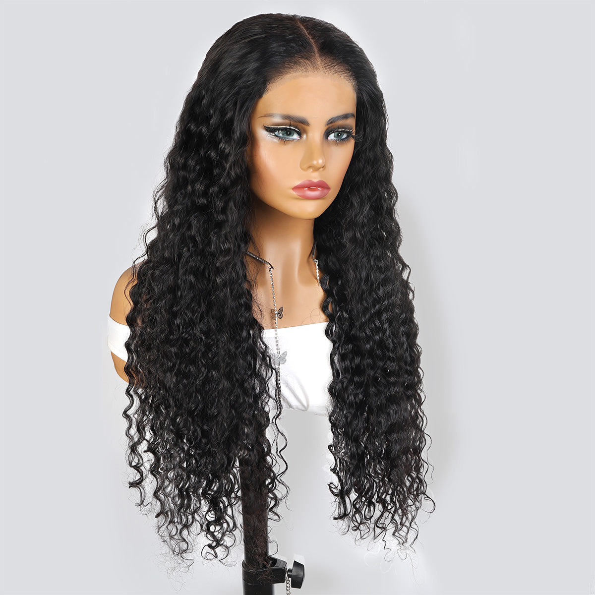 Long Black Deep Wave HD Lace Wig On Mannequin Highlighting Natural Curls and Shine