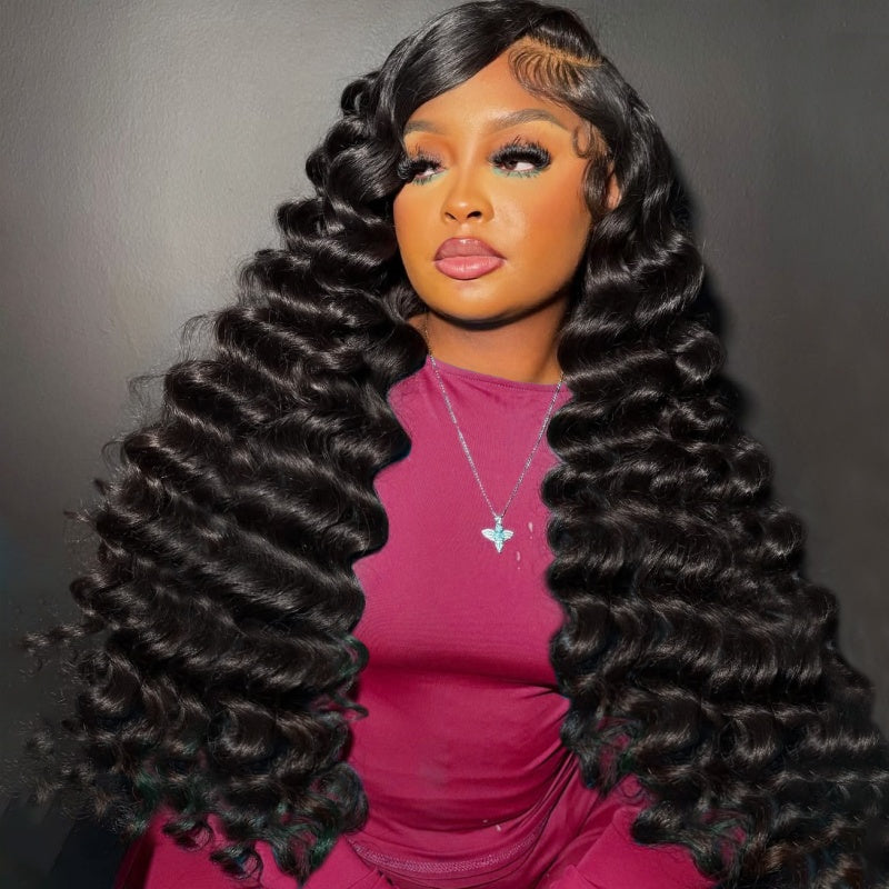 Woman wearing Ishow Hair natural black glueless loose deep wave wig, featured with with 5*5 HD lace, showcasing its voluminous and shiny wave texture.