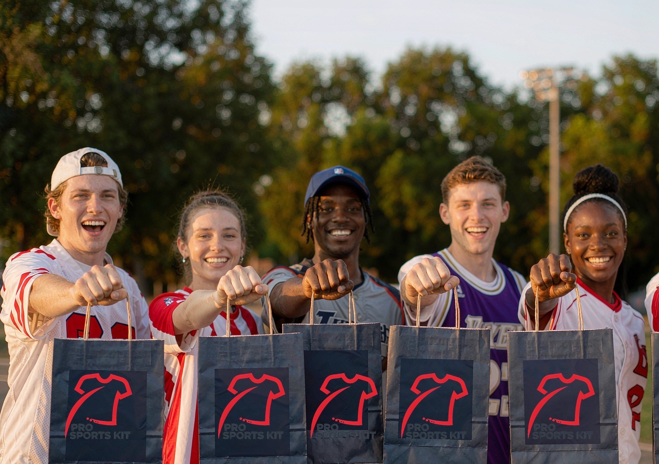 Happy fans celebrating with their new team jerseys from Pro Sports Kit
