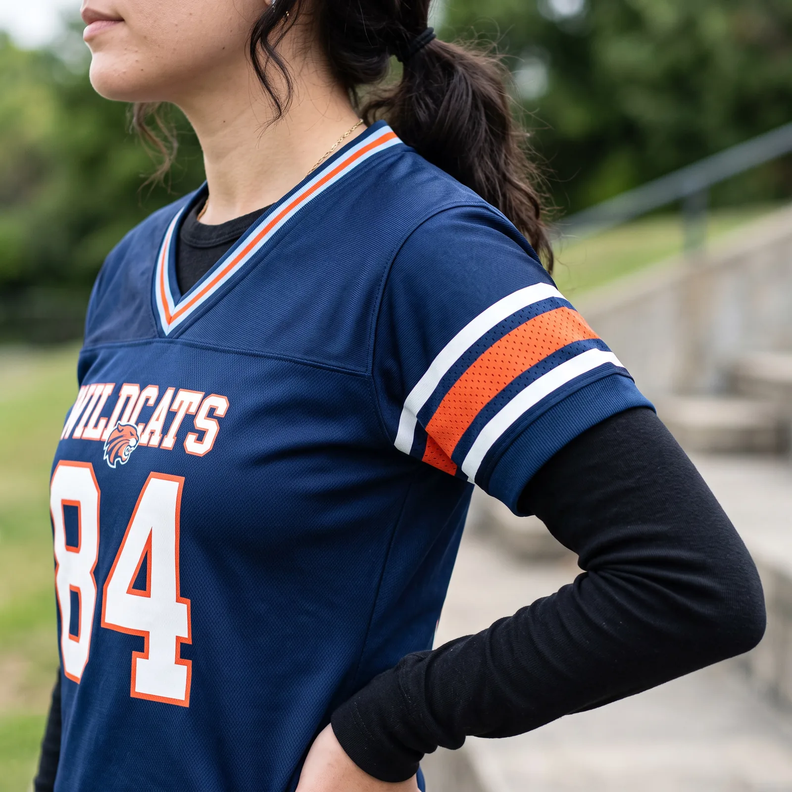 A fitted base layer under the jersey adds warmth without breaking the tailored fit.