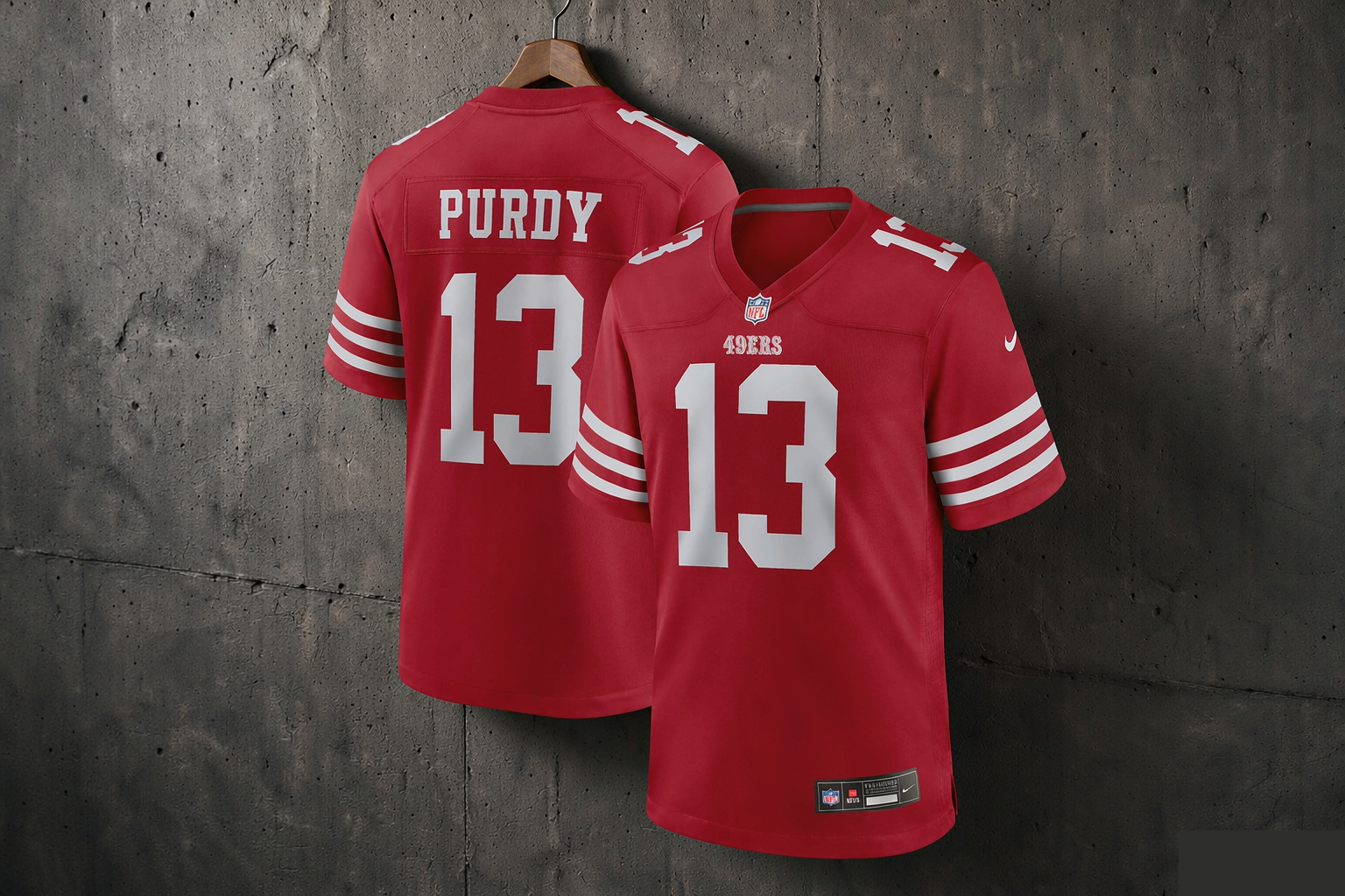 Brock Purdy San Francisco 49ers number 13 scarlet football jersey hanging on a hanger, editorial product photograph for the Mexico City international game