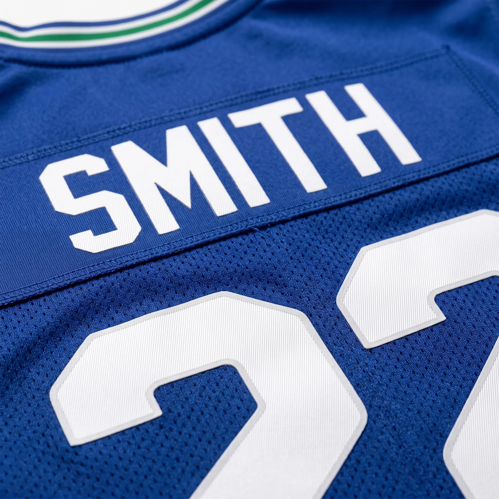 A custom name and number turns a youth jersey into a keepsake — size it right first.