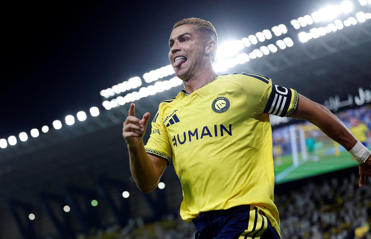 Ronaldo celebrating in 2026/27 Al-Nassr home kit