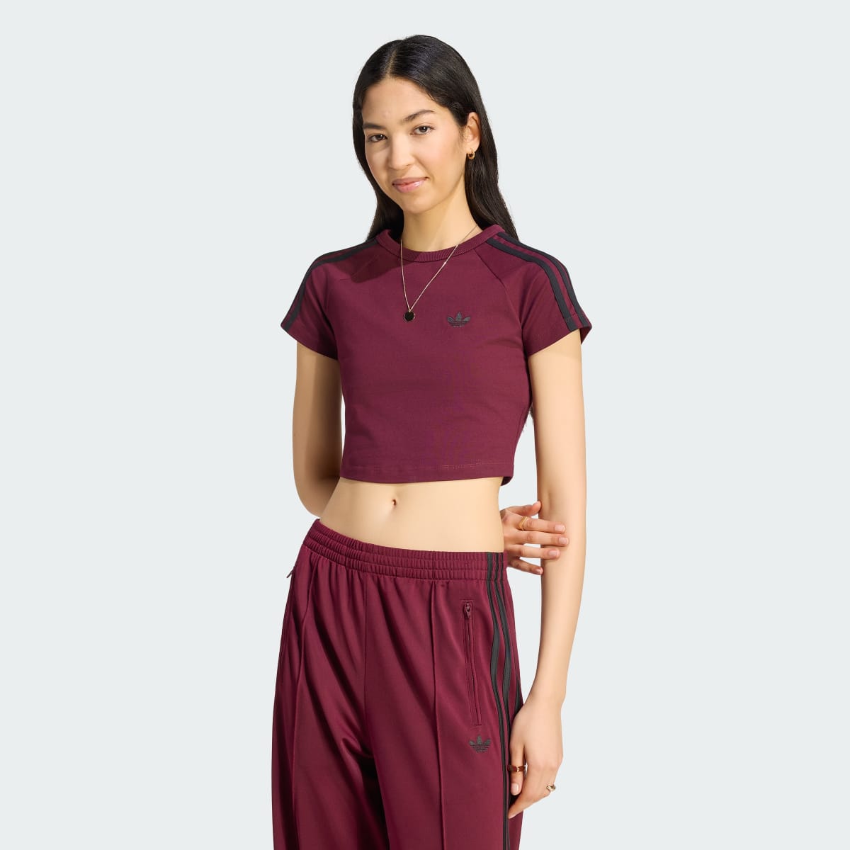 Camiseta deportiva para mujer color granate y negro - vista 1