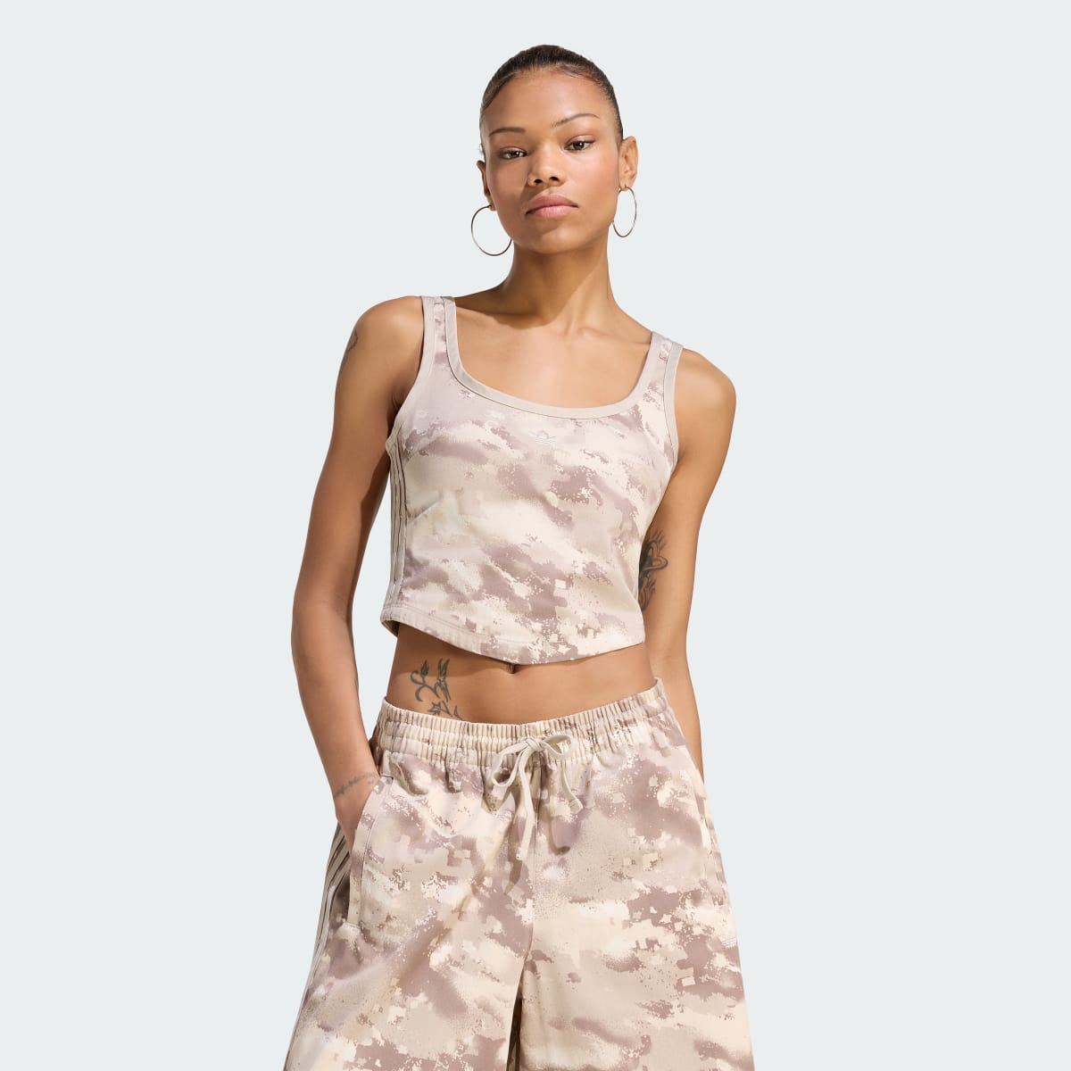 Prenda deportiva para mujer color beige - vista 1