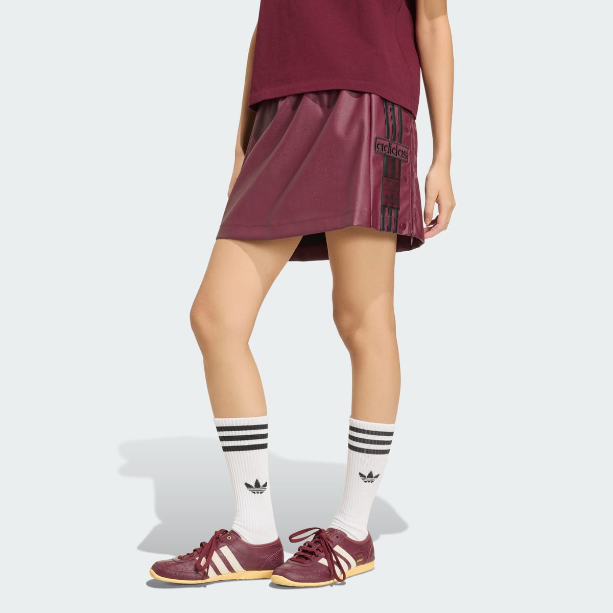 Prenda deportiva para mujer color granate y negro - vista 1