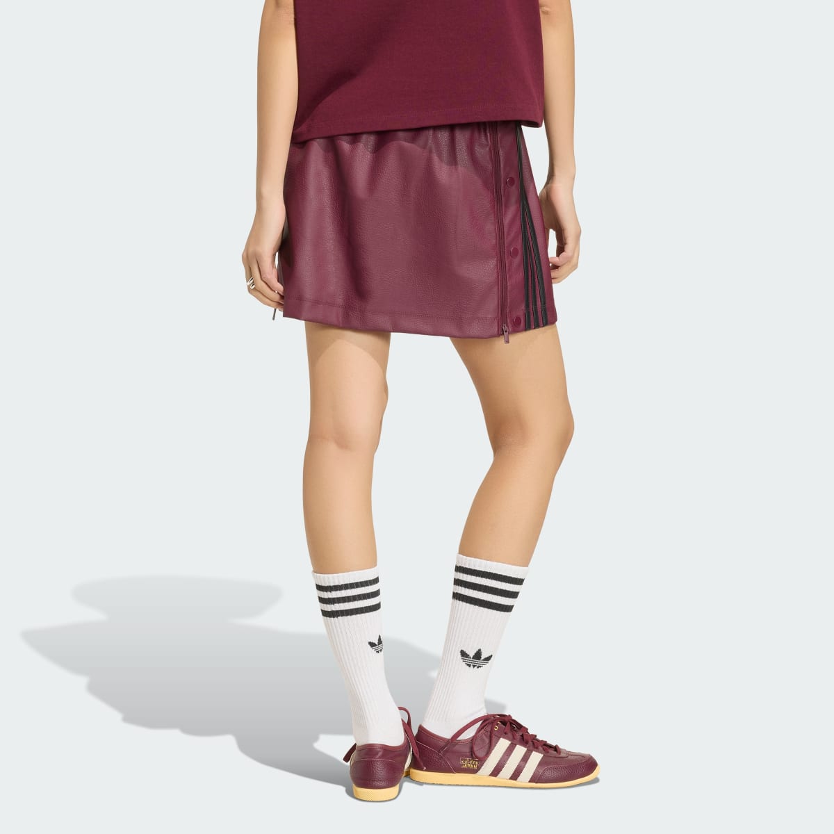 Prenda deportiva para mujer color granate y negro - vista 3
