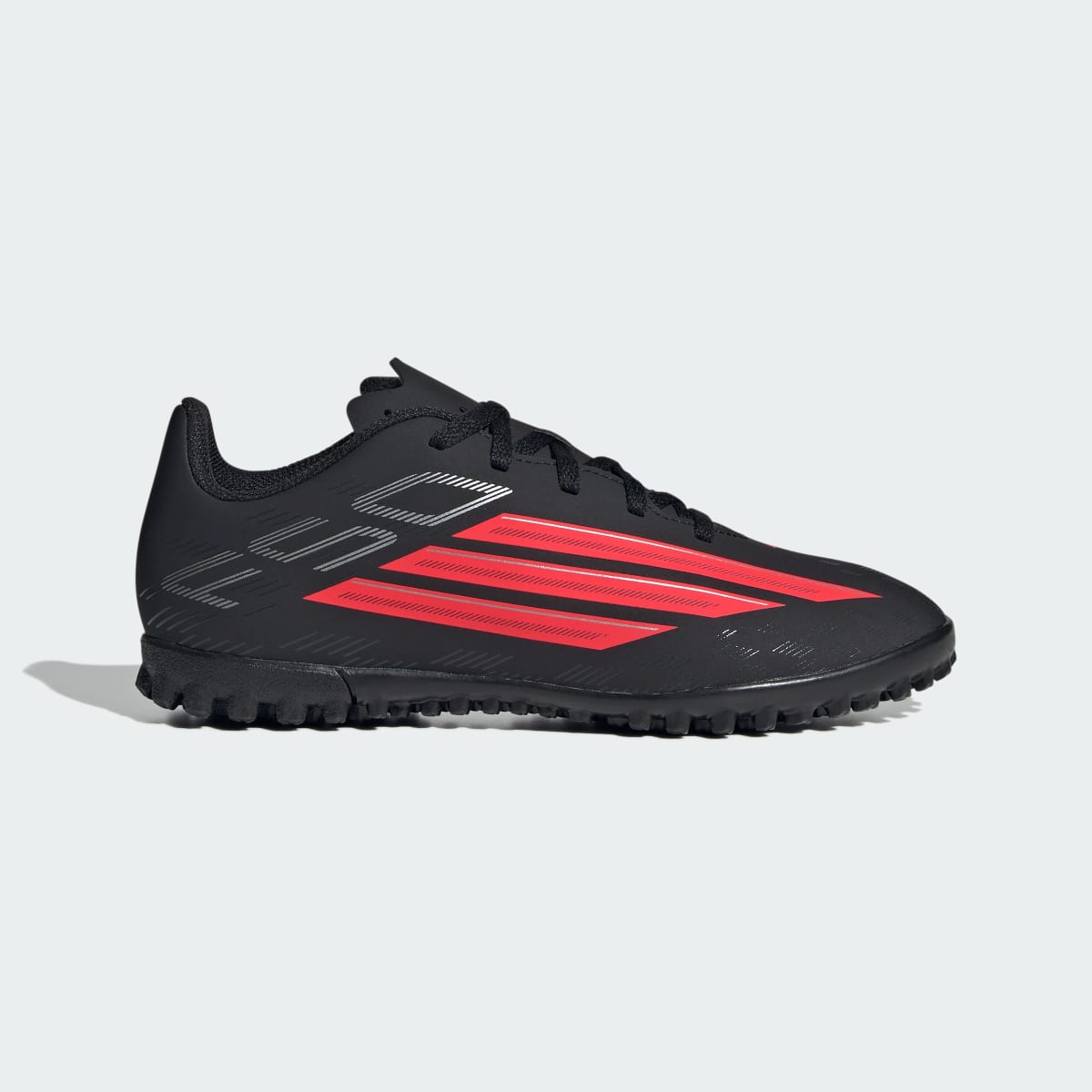 Guayos de fútbol para niños color negro y rojo - vista 2