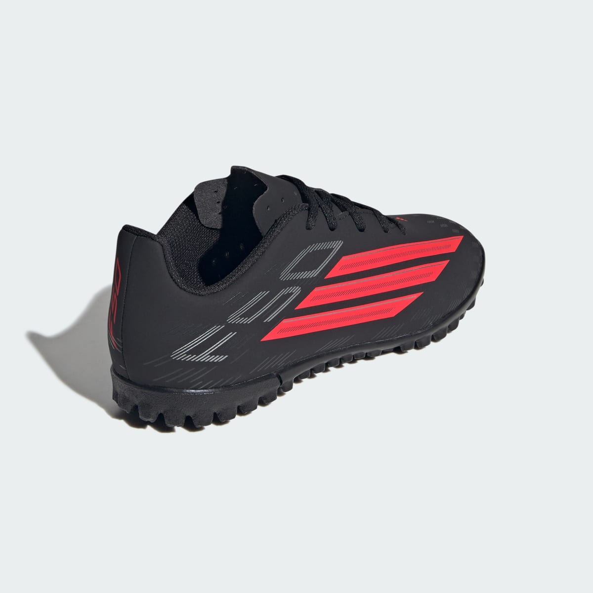 Guayos de fútbol para niños color negro y rojo - vista 6