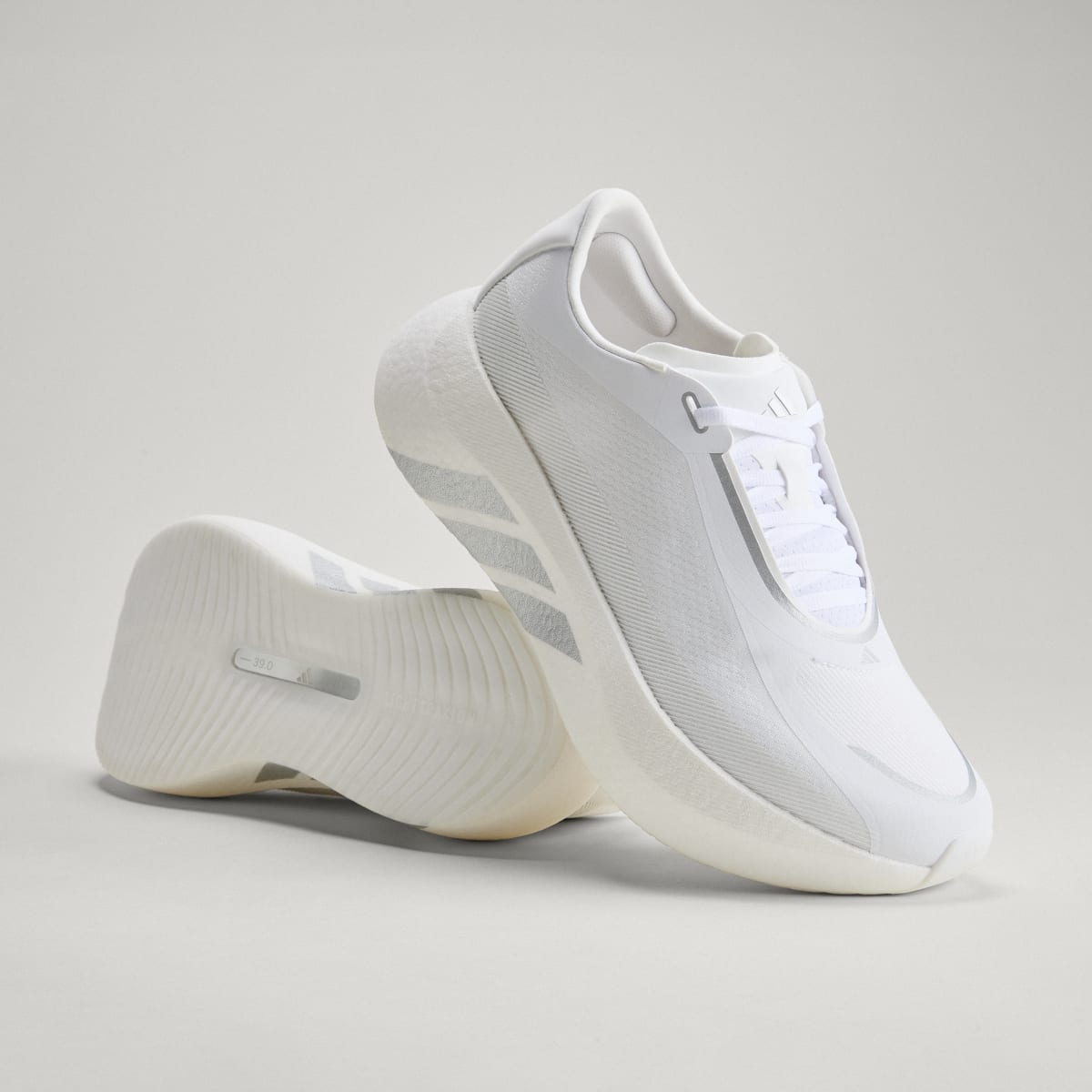 Tenis de running para hombre color blanco y plateado - vista 1