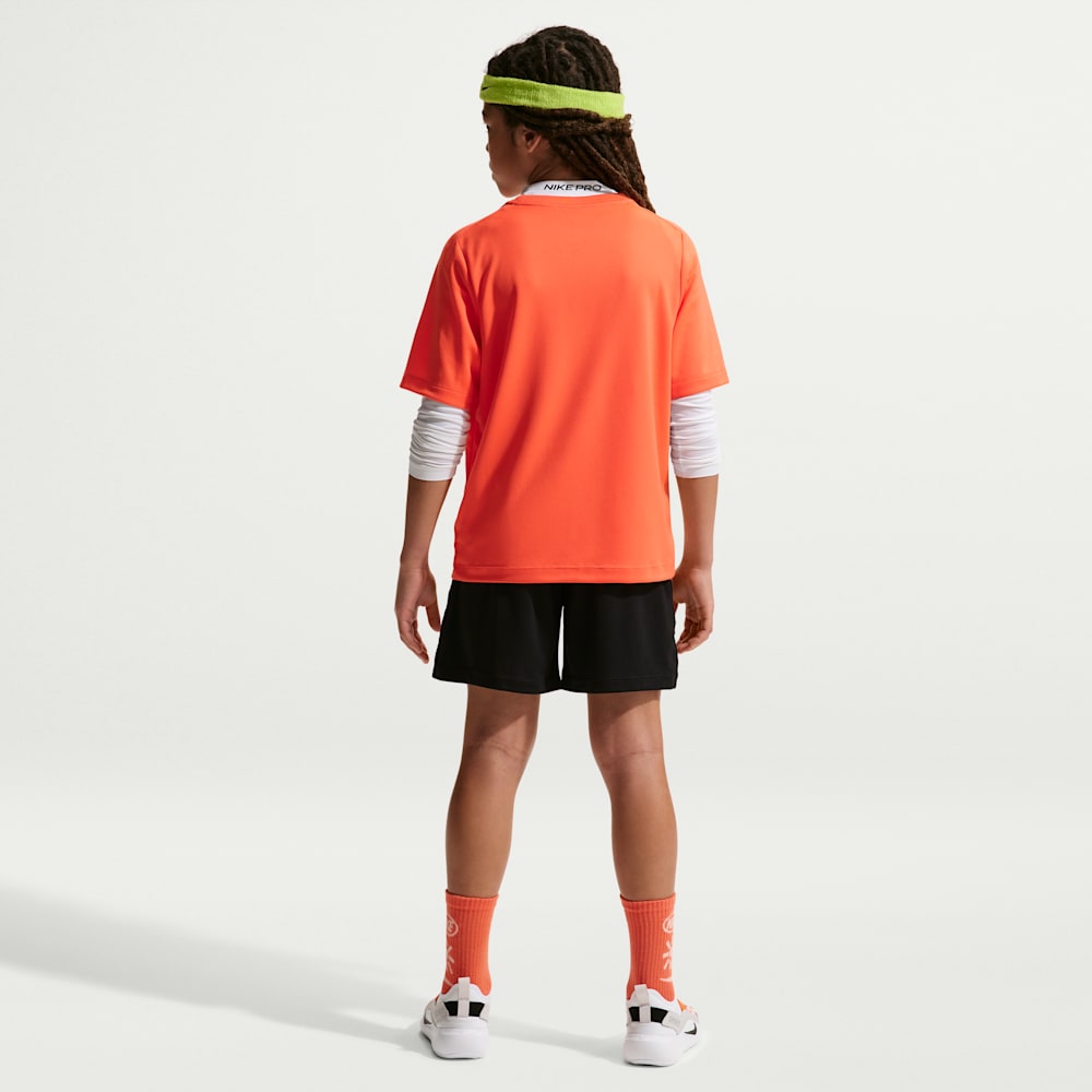 Camisetas y esqueletos para entrenamiento para niño en naranja · IF2430-842 - vista 5