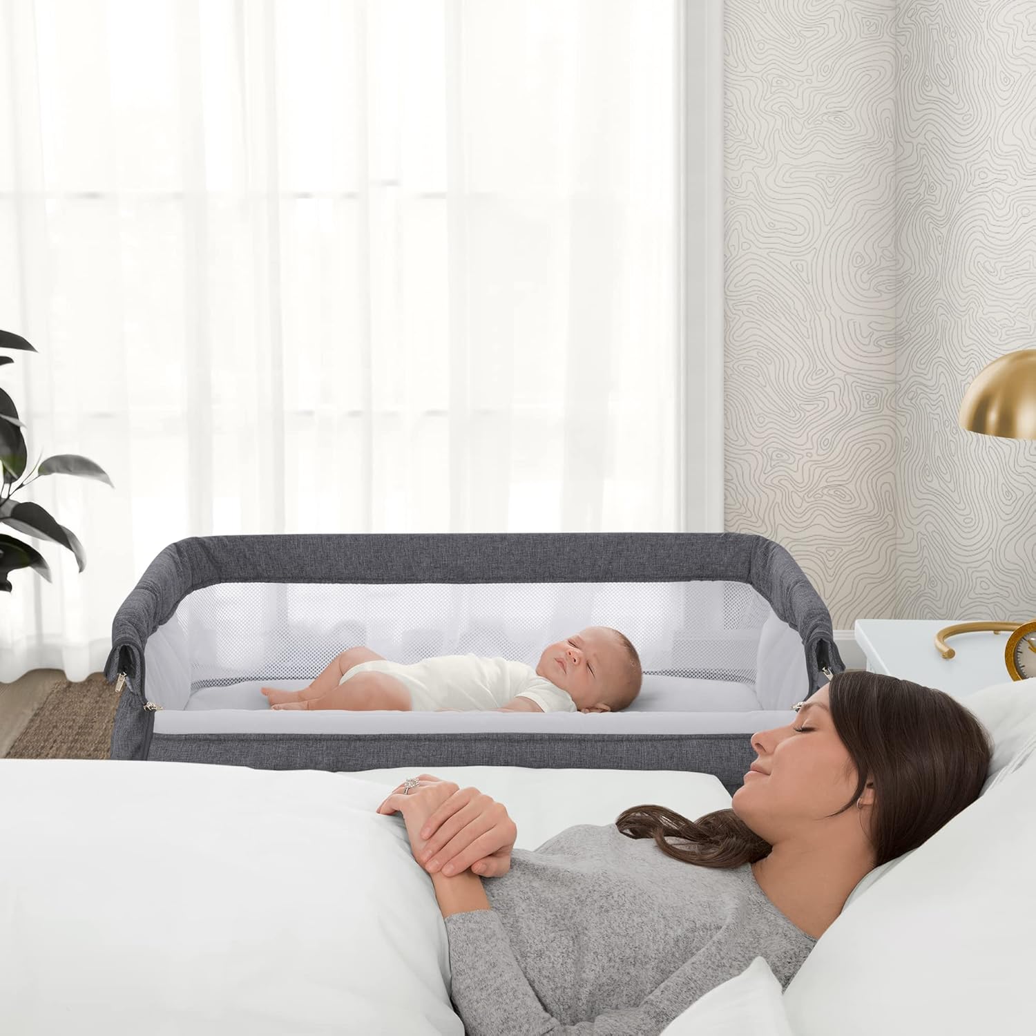 Delta Children Simmons Kids Dream Bedside Bassinet with Zip-Down Side Wall – Convenient Baby Sleeper with Breathable Mesh and Adjustable Heights