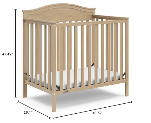 Graco Stella 4-in-1 Convertible Mini Crib with Bonus Mattress (Driftwood) – Includes Bonus 2.50 Inch Thick Mattress with Water-Resistant Cover