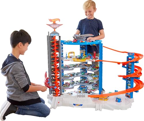 Hot Wheels Toy Car Track Set & 4 1:64 Scale Cars, Super Ultimate Garage, 3+ ft Tall with Motorized Gorilla & Storage for 140 Cars (Amazon Exclusive)