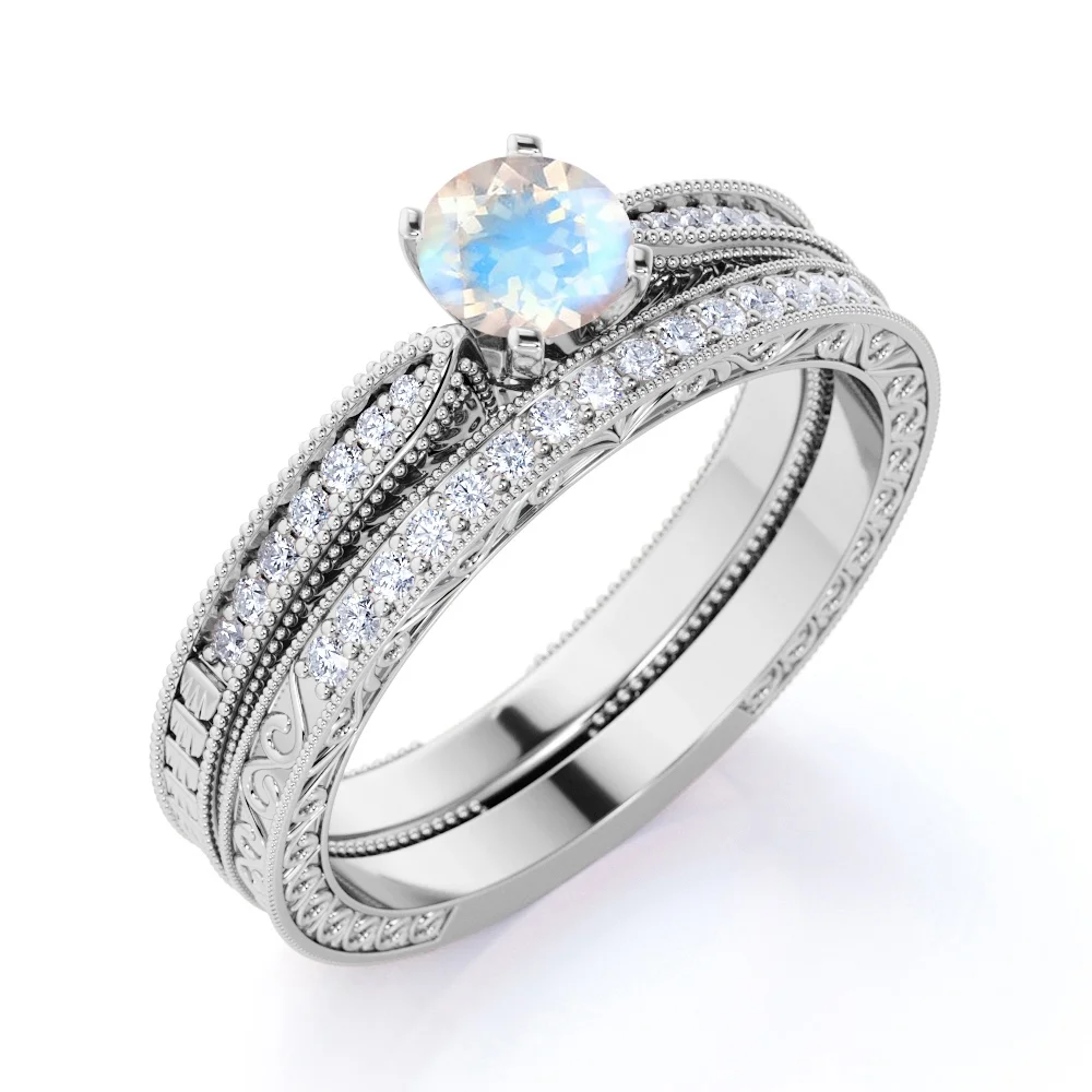 JeenMata 1.75 Carat Round Cut Moonstone and Moissanite Wedding Ring Set with Milgrains in 18k White Gold over Silver