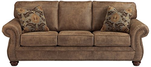 Signature Design by Ashley Olsberg Faux Leather Sofa with Nailhead Trim and 4 Accent Pillows
