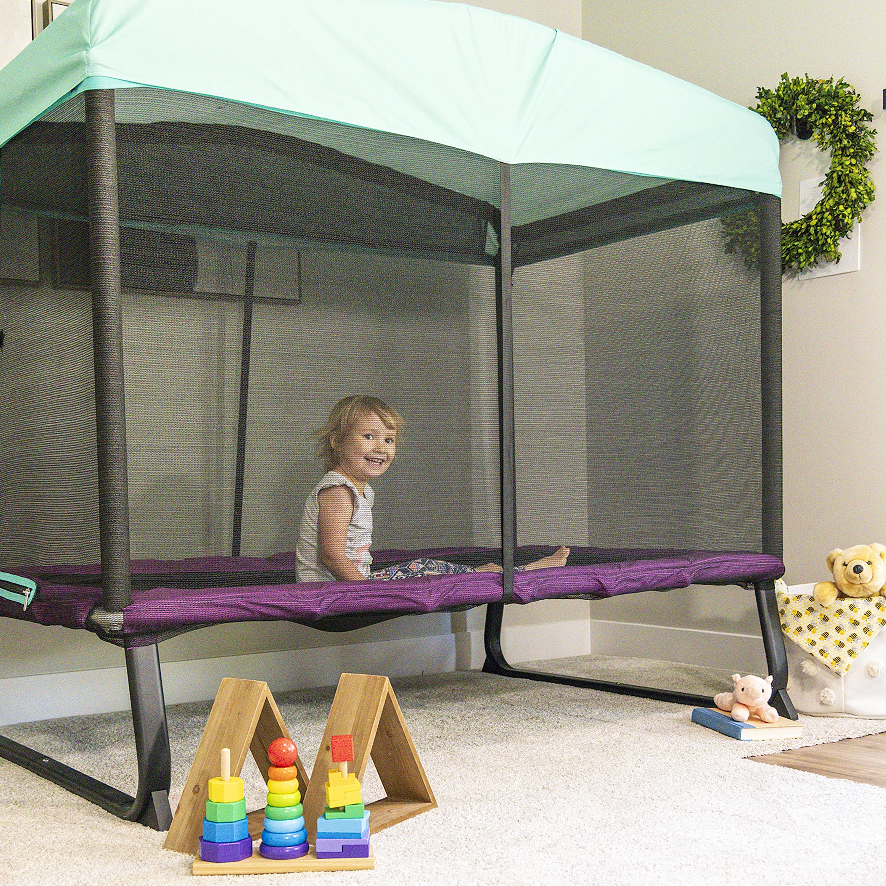 SKYWALKER TRAMPOLINES 6x4ft Indoor Mini Trampoline for Kids and Toddlers with Net Enclosure, Durable Steel Frame