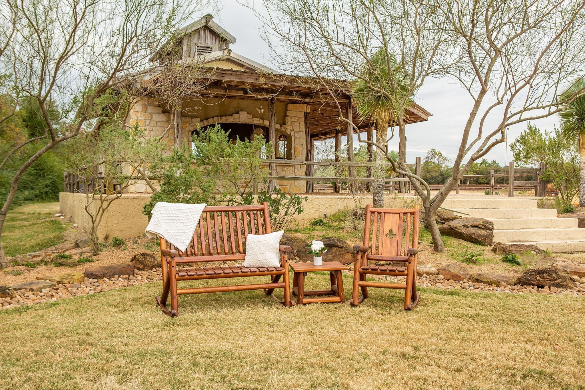 Leigh Country TX 36003 Amber-Log Fleur-De-Lis Adult Wood Outdoor Patio Rocking Chair - Brown
