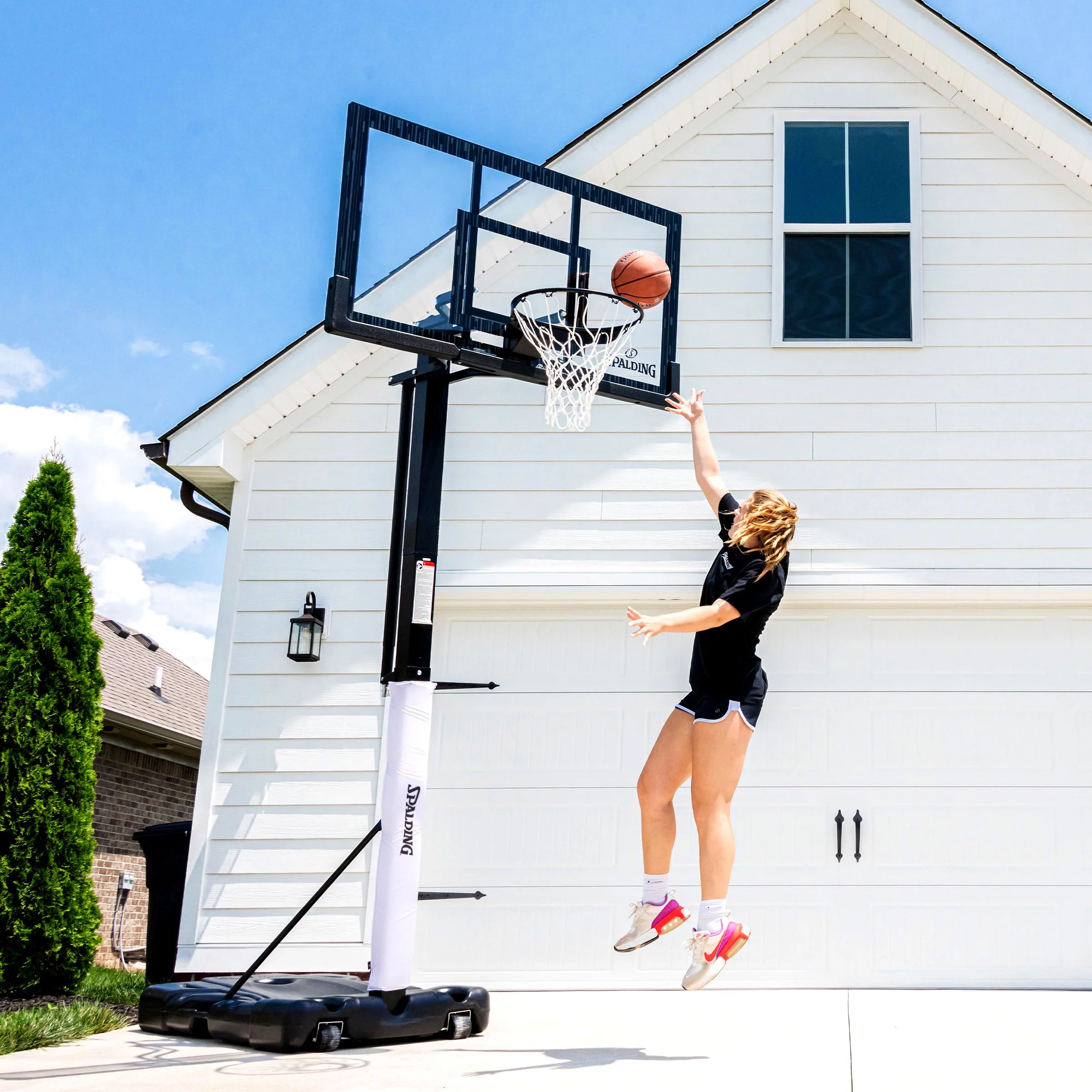 Spalding 60 In. Acrylic Screw Jack Portable Basketball Hoop System