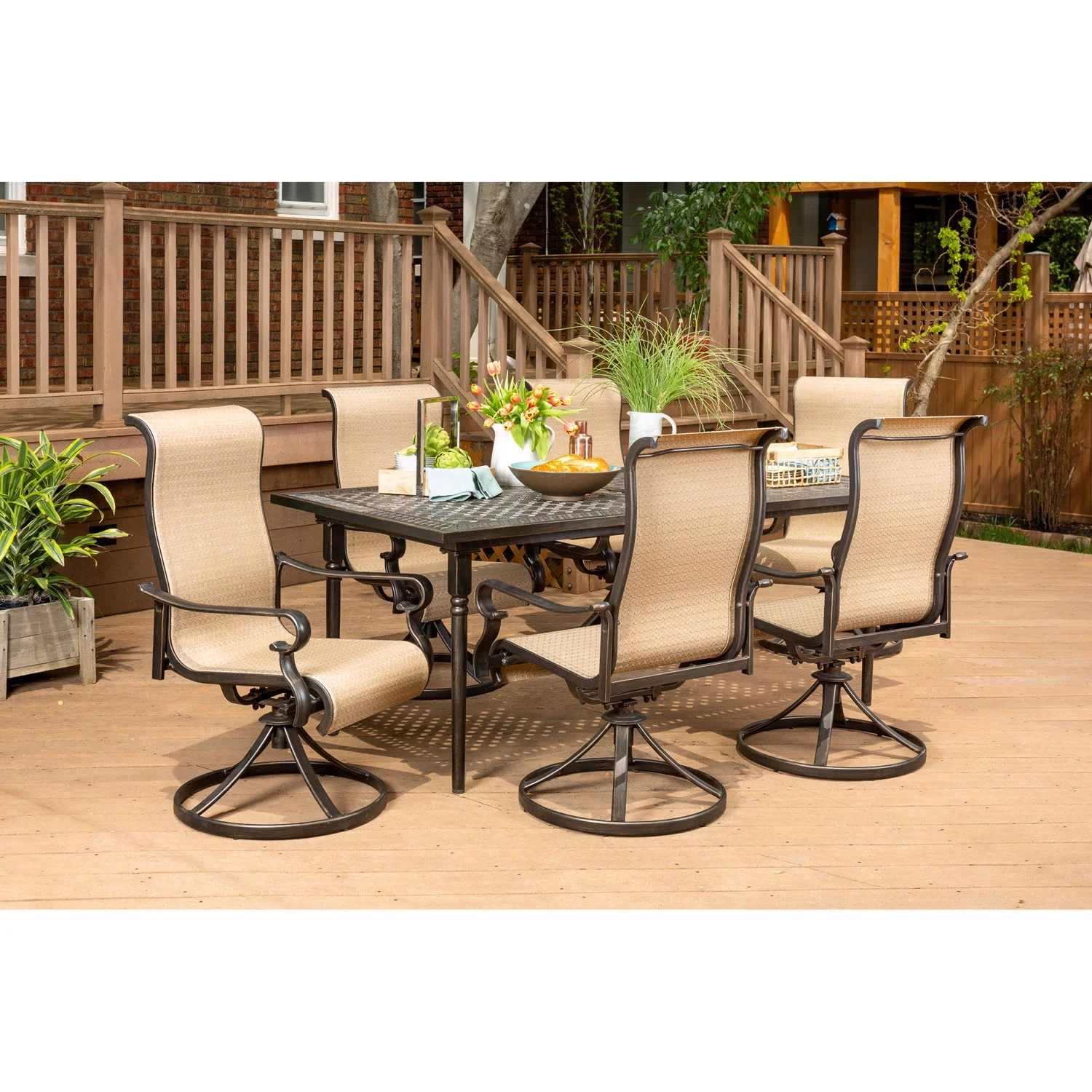 Hanover Brigantine 7-Piece Dining Set with an Expandable Cast-Top Dining Table and 6 Sling Swivel Rockers
