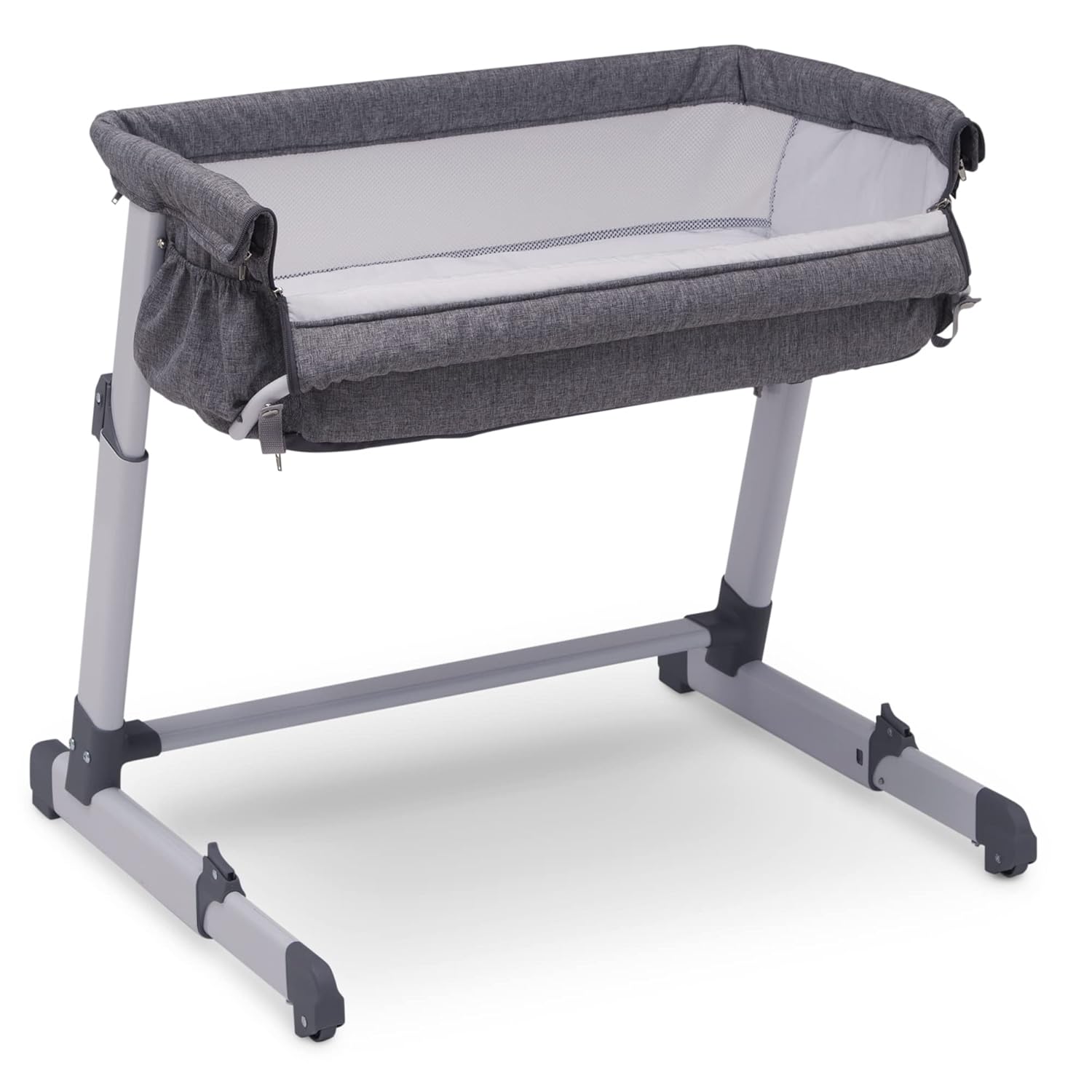 Delta Children Simmons Kids Dream Bedside Bassinet with Zip-Down Side Wall – Convenient Baby Sleeper with Breathable Mesh and Adjustable Heights