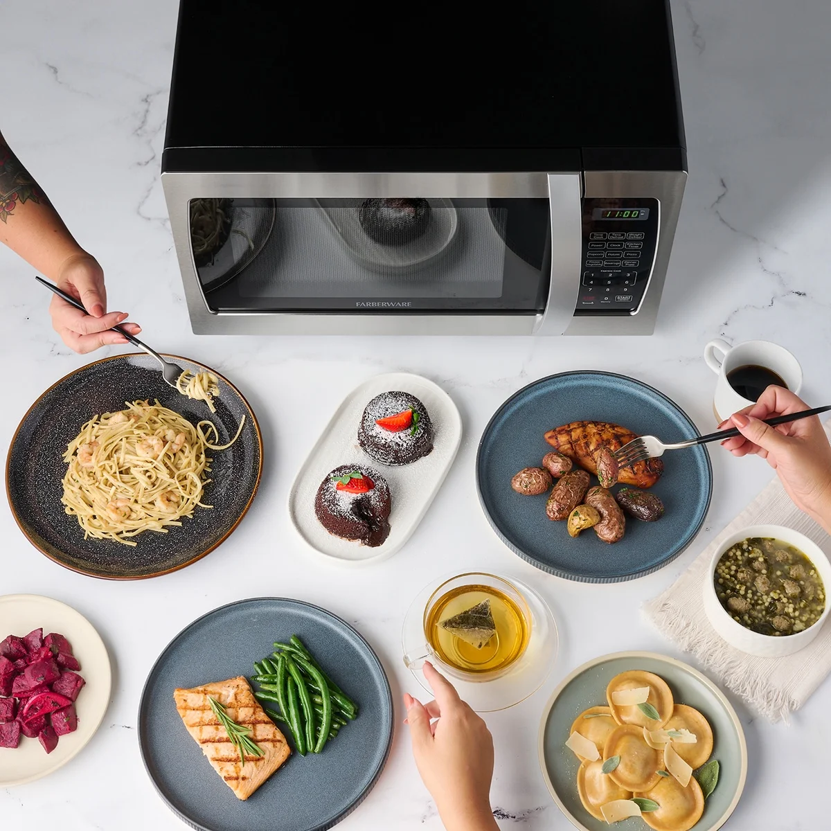 Farberware Countertop Microwave 1000 Watts, 1.3 cu ft - Microwave Oven With LED Lighting and Child Lock - Perfect for Apartments and Dorms
