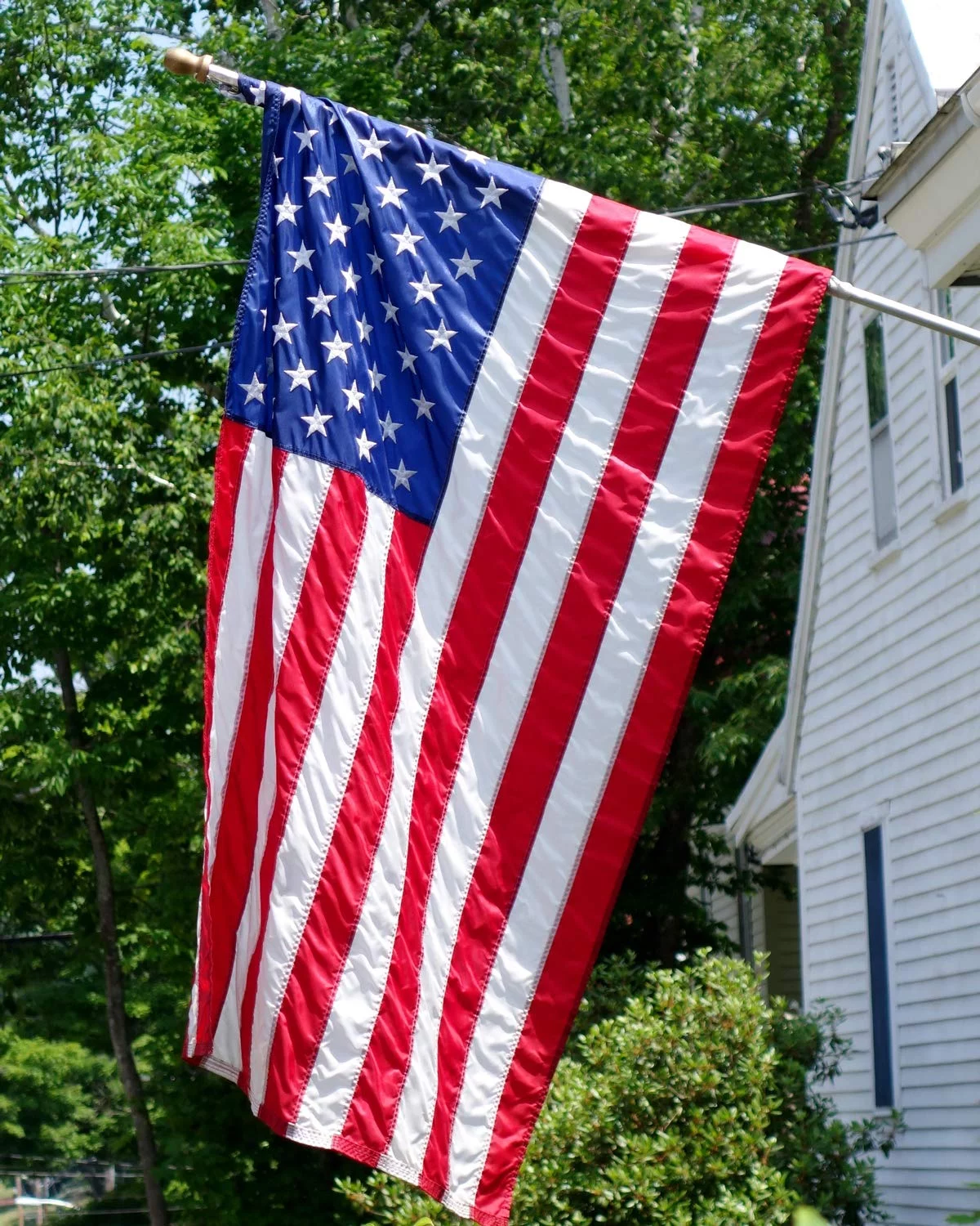 American Flag 10x15 FT Outdoor - USA Heavy duty Nylon US Flags with Embroidered Stars, Sewn Stripes and Brass Grommets