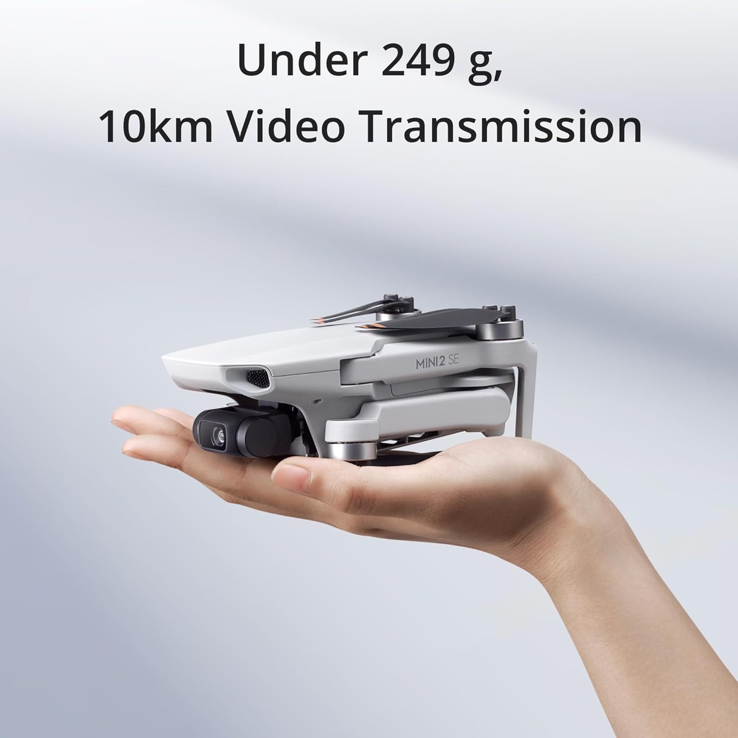 DJI Mini 2 SE Fly More Combo with 64GB Memory Card- Lightweight and Foldable Mini Camera Drone with 2.7K Video, Extra Batteries