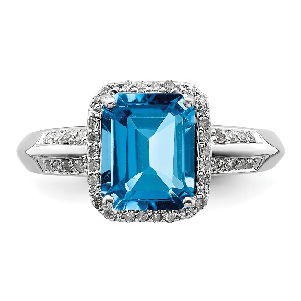 Sterling Silver Blue Topaz & Diamond Ring. Carat Wt- 0.15ct. Gem Wt- 3ct