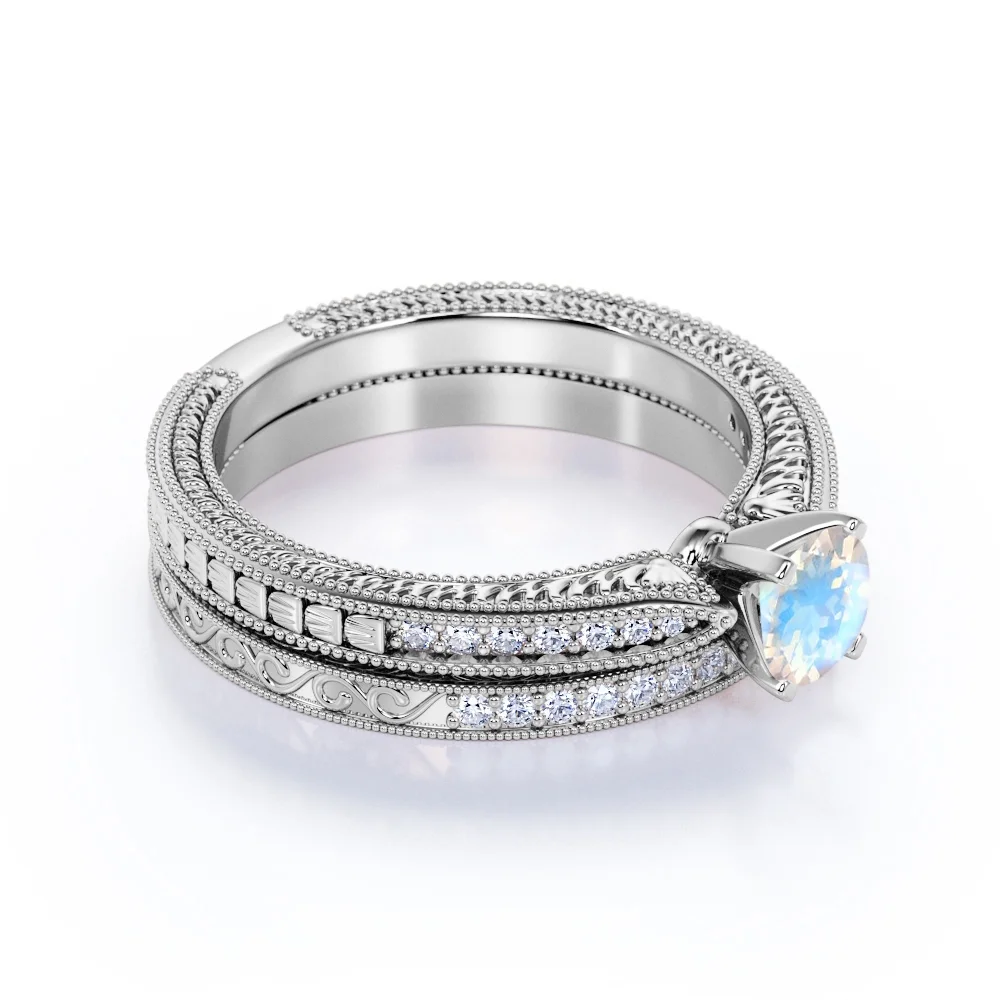 JeenMata 1.75 Carat Round Cut Moonstone and Moissanite Wedding Ring Set with Milgrains in 18k White Gold over Silver