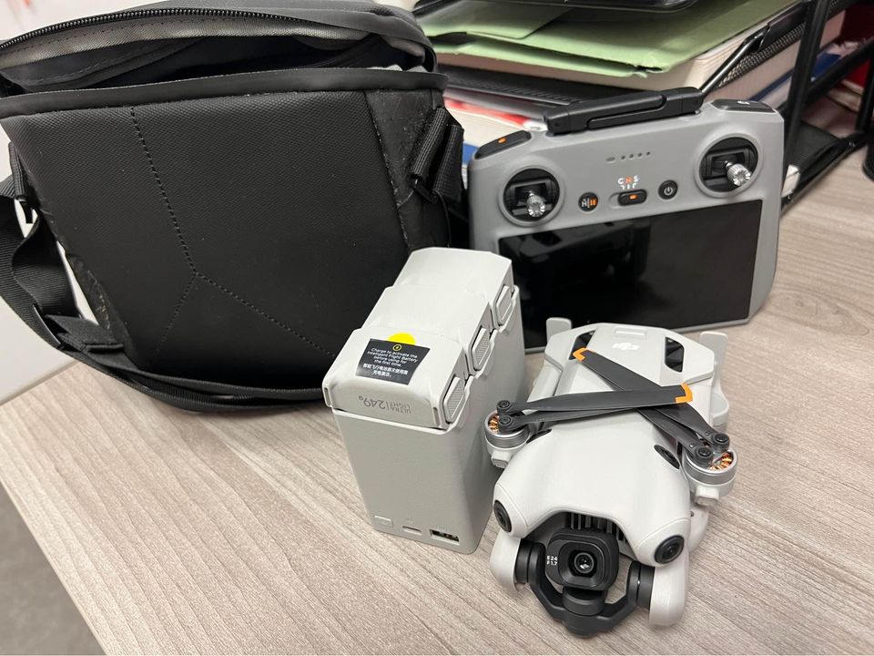DJI Mini 4 Pro Fly More Combo with DJI RC 2 (screen remote controller), Folding Mini-Drone with 4K HDR Video Camera for Adults, Under 0.549 lbs249 g