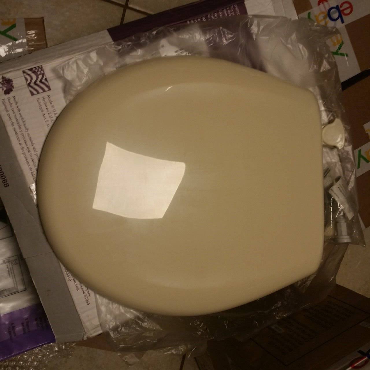 Bemis 200slowt 221 Plastic Round Slow-Close Toilet Seat in Creamy Yellow