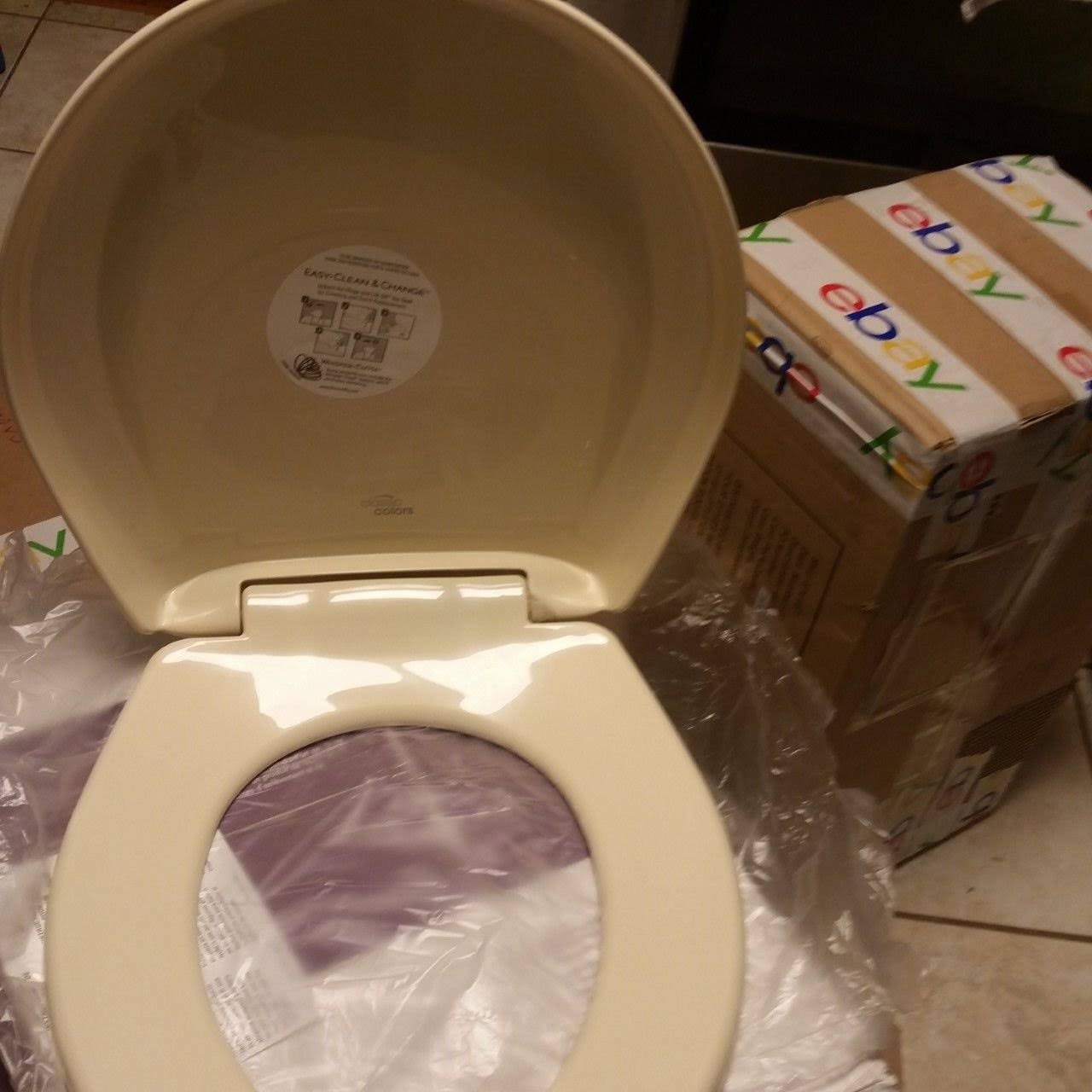 Bemis 200slowt 221 Plastic Round Slow-Close Toilet Seat in Creamy Yellow