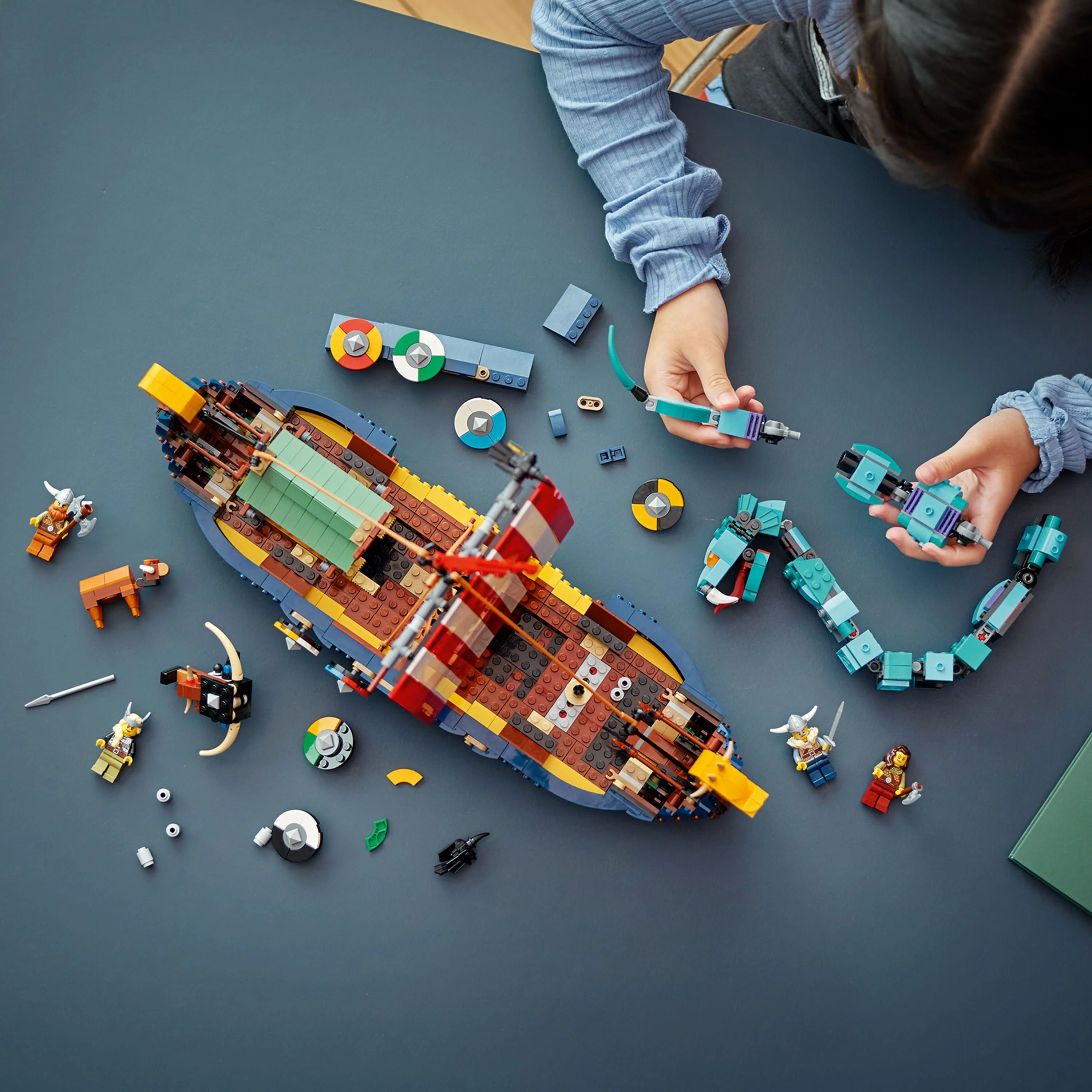 LEGO Creator 3 in 1 Viking Ship and the Midgard Serpent, Transforms from Amazing Ship to Viking House or Fenris Wolf Figure, Gifts for Kids, Boys