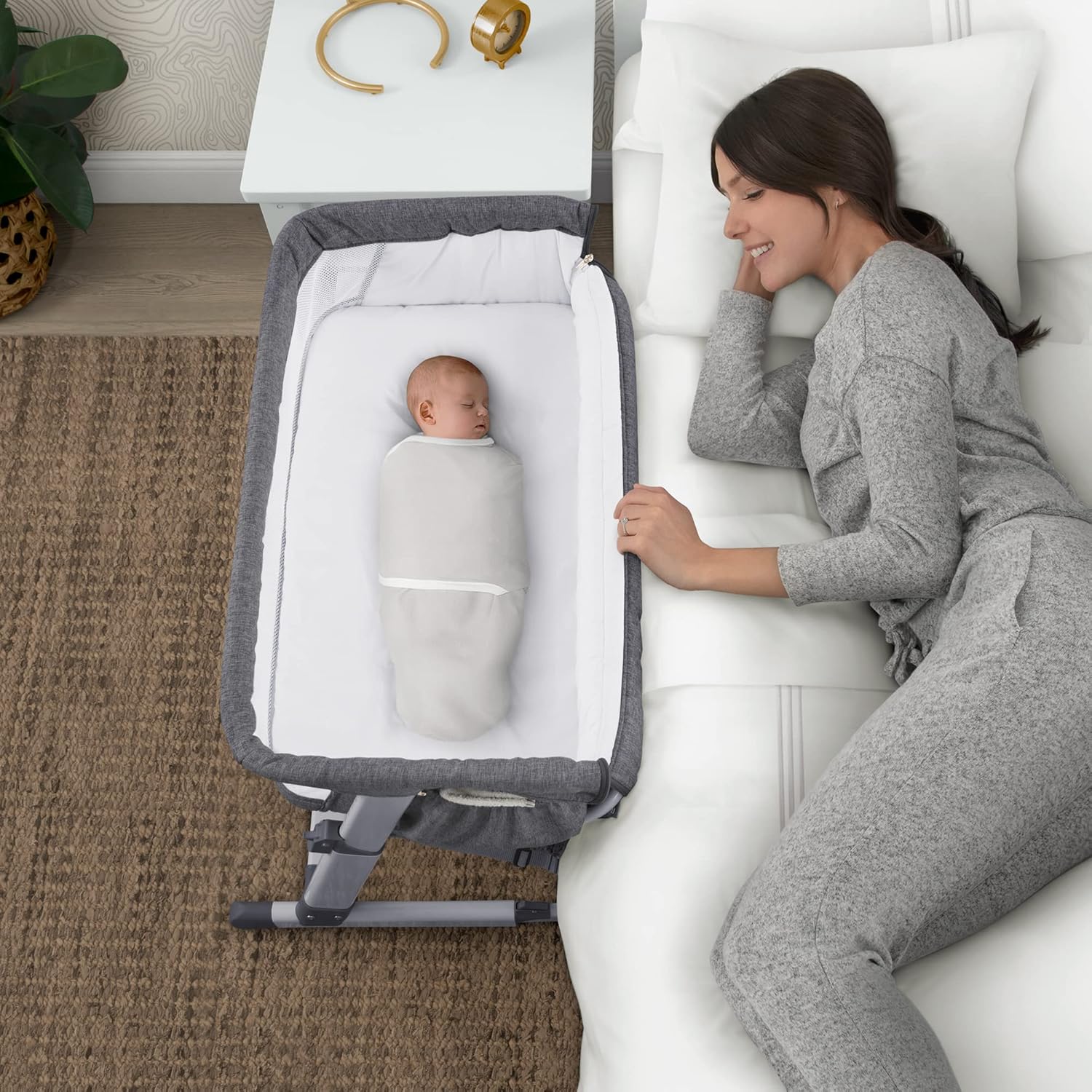 Delta Children Simmons Kids Dream Bedside Bassinet with Zip-Down Side Wall – Convenient Baby Sleeper with Breathable Mesh and Adjustable Heights
