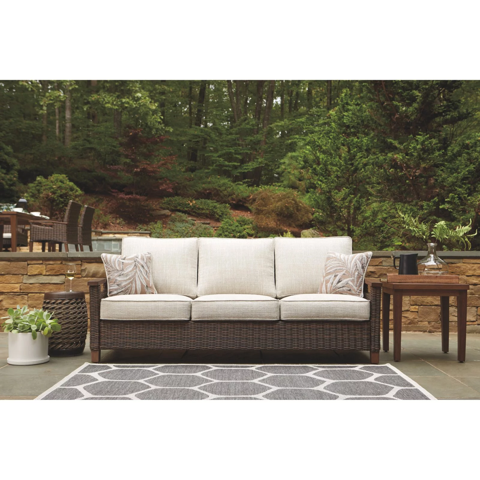 Ashley Furniture Paradise Trail Patio Sofa in Medium Brown