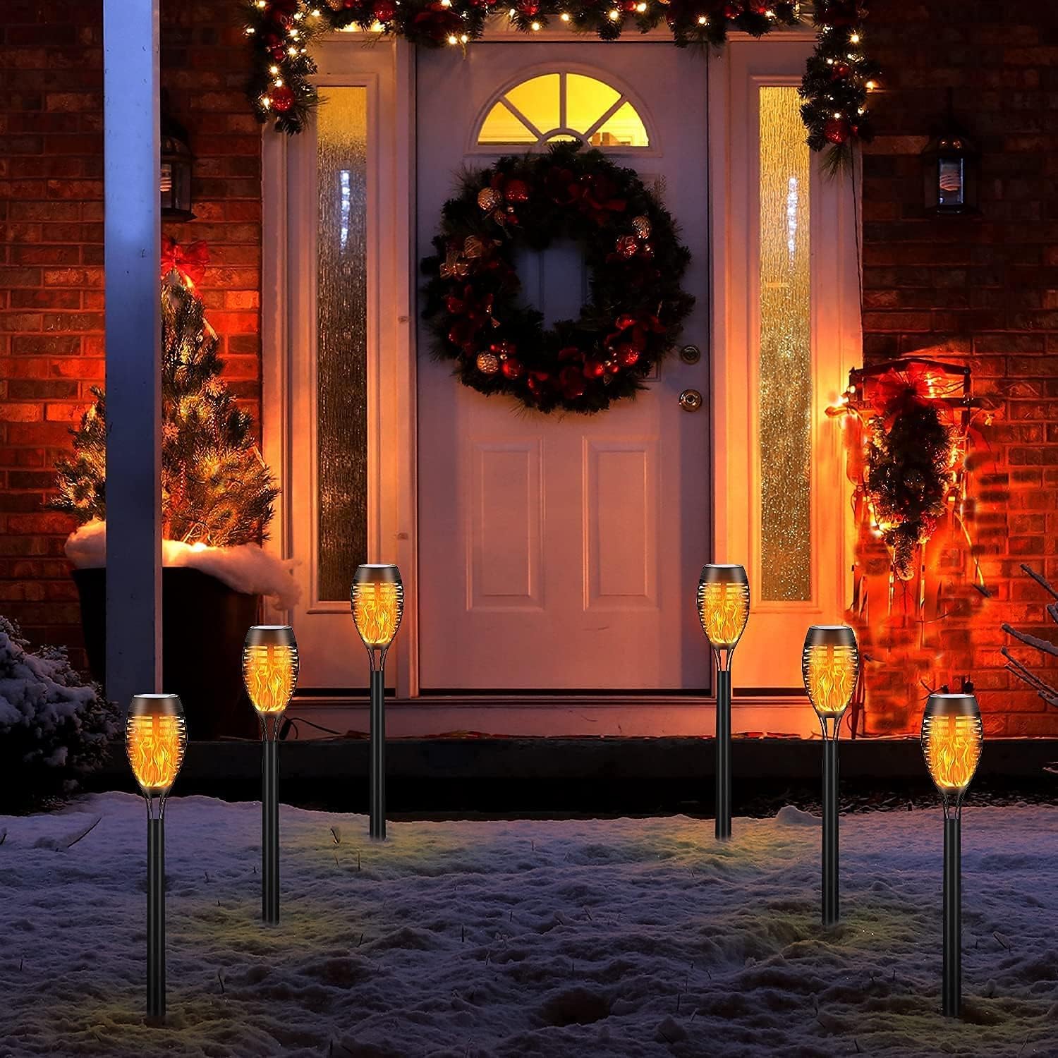 SOLATINO Solar Torch Light with Flickering Flame, 12 Pack Landscape Decoration Solar Torch Lights Halloween Christmas