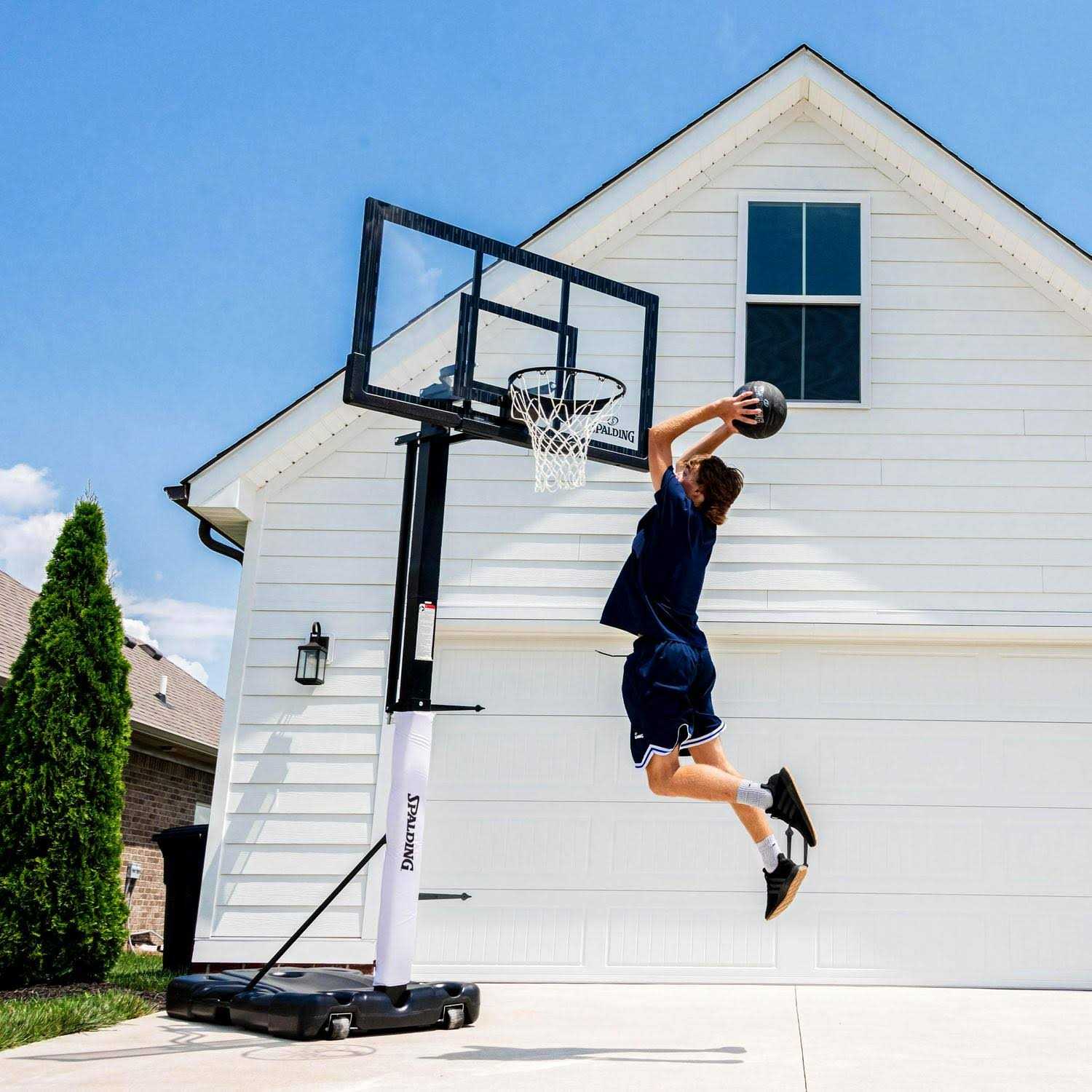 Spalding 60 in. Acrylic Screw Jack Portable Basketball Hoop System - Sports Supplies Online Store