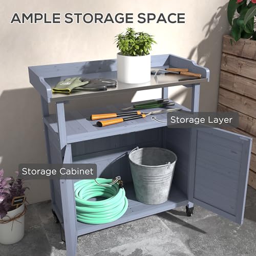 Outsunny Outdoor Wooden Potting Bench Table, Garden Workstation with Storage Cabinet, Aluminum Table Top, Rubber Wheels for Backyard, Patio, Balcony
