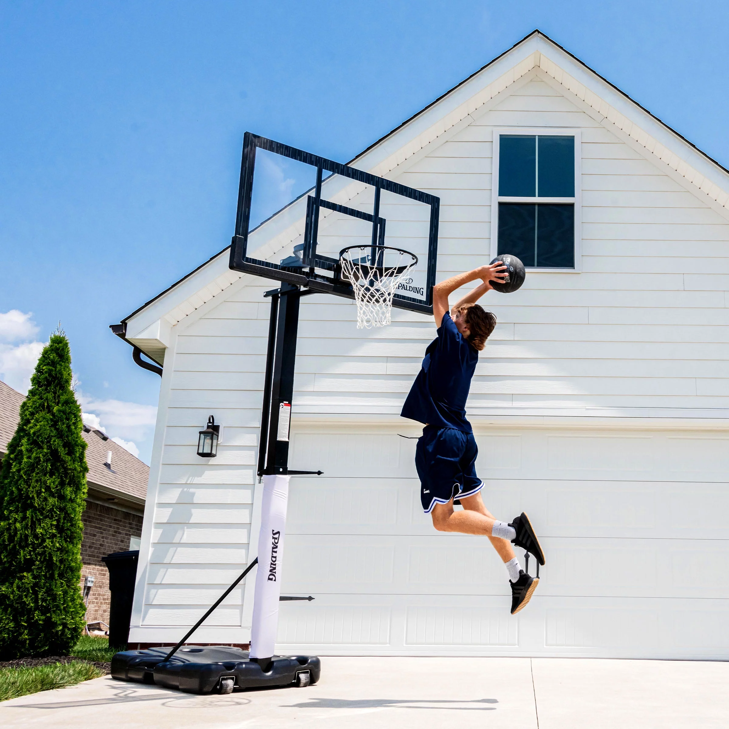 Spalding 60 In. Acrylic Screw Jack Portable Basketball Hoop System