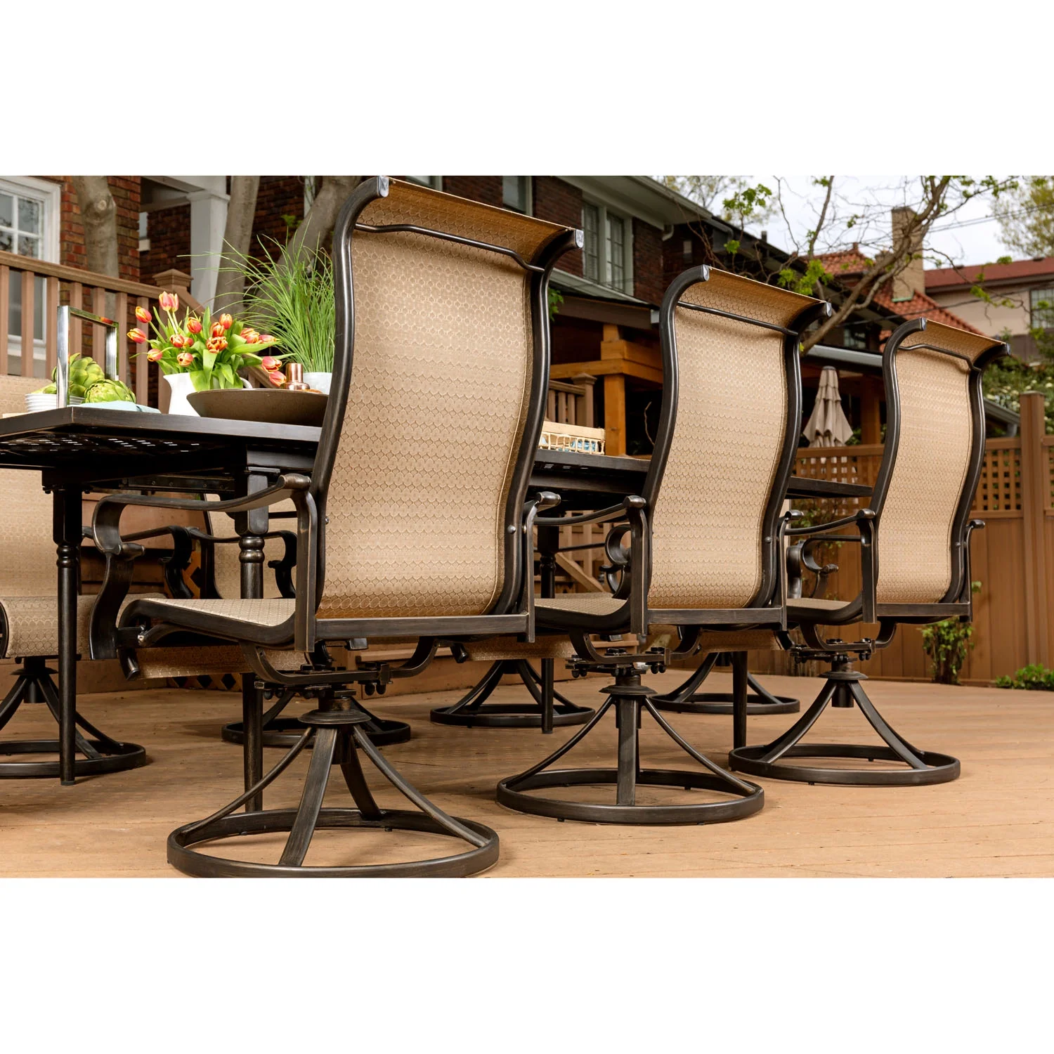 Hanover Brigantine 7-Piece Dining Set with an Expandable Cast-Top Dining Table and 6 Sling Swivel Rockers