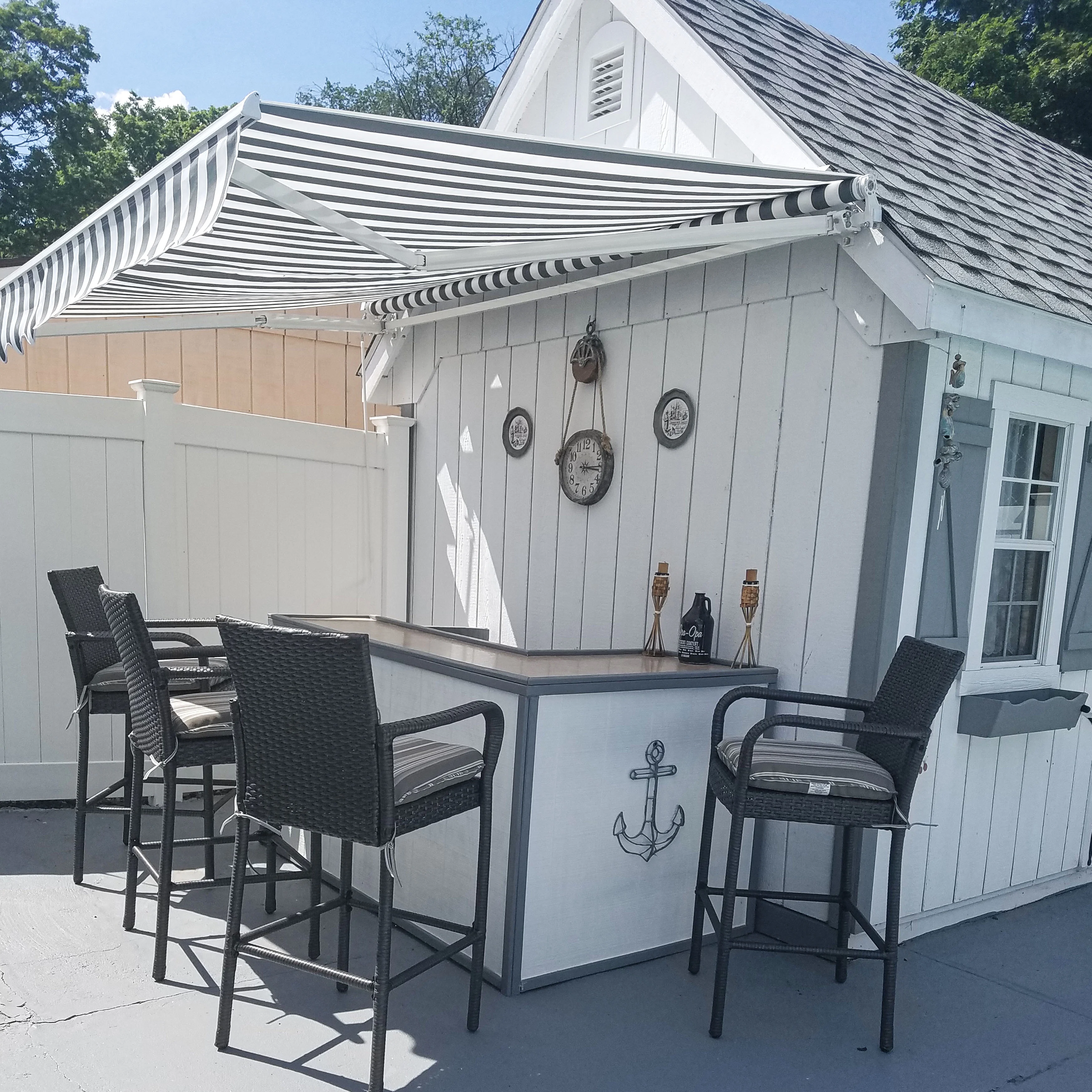 ALEKO 20' x 10' Retractable Motorized Patio Awning, Gray and White Striped Color