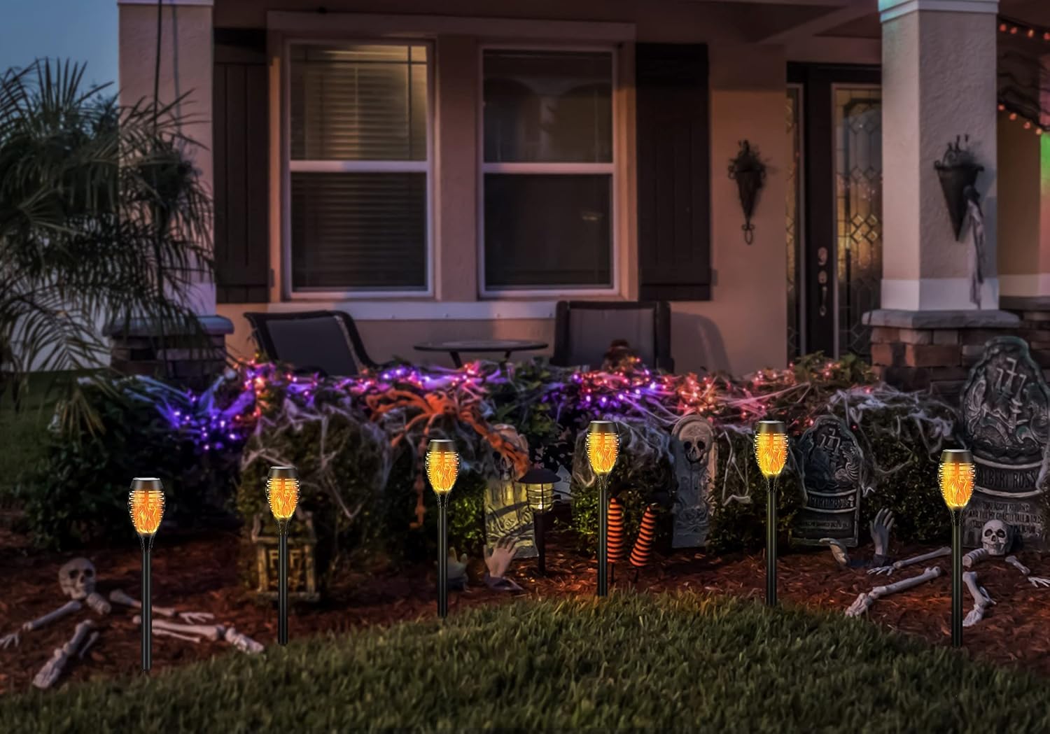 SOLATINO Solar Torch Light with Flickering Flame, 12 Pack Landscape Decoration Solar Torch Lights Halloween Christmas