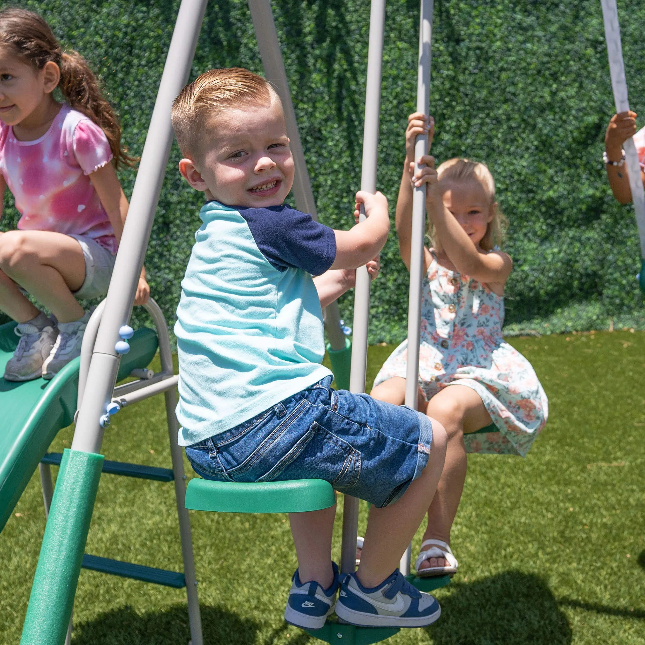 The Swing Company Yonkers Metal Swing Set with Glide Ride Trapeze Bar and 5' Slide