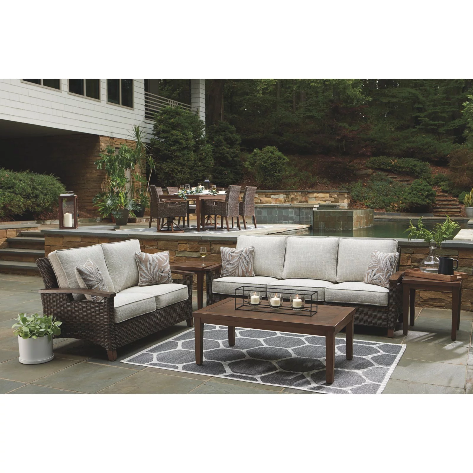 Ashley Furniture Paradise Trail Patio Sofa in Medium Brown